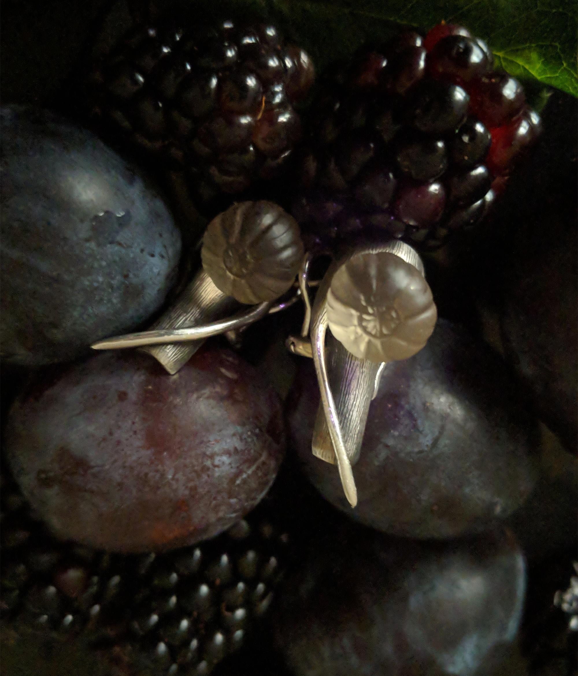 These contemporary fig earrings feature frosted smoky quartzes set in silver and are available for immediate shipping, whereas in other cases it may take longer to cut the gems. This handcrafted designer jewelry piece is part of a limited edition