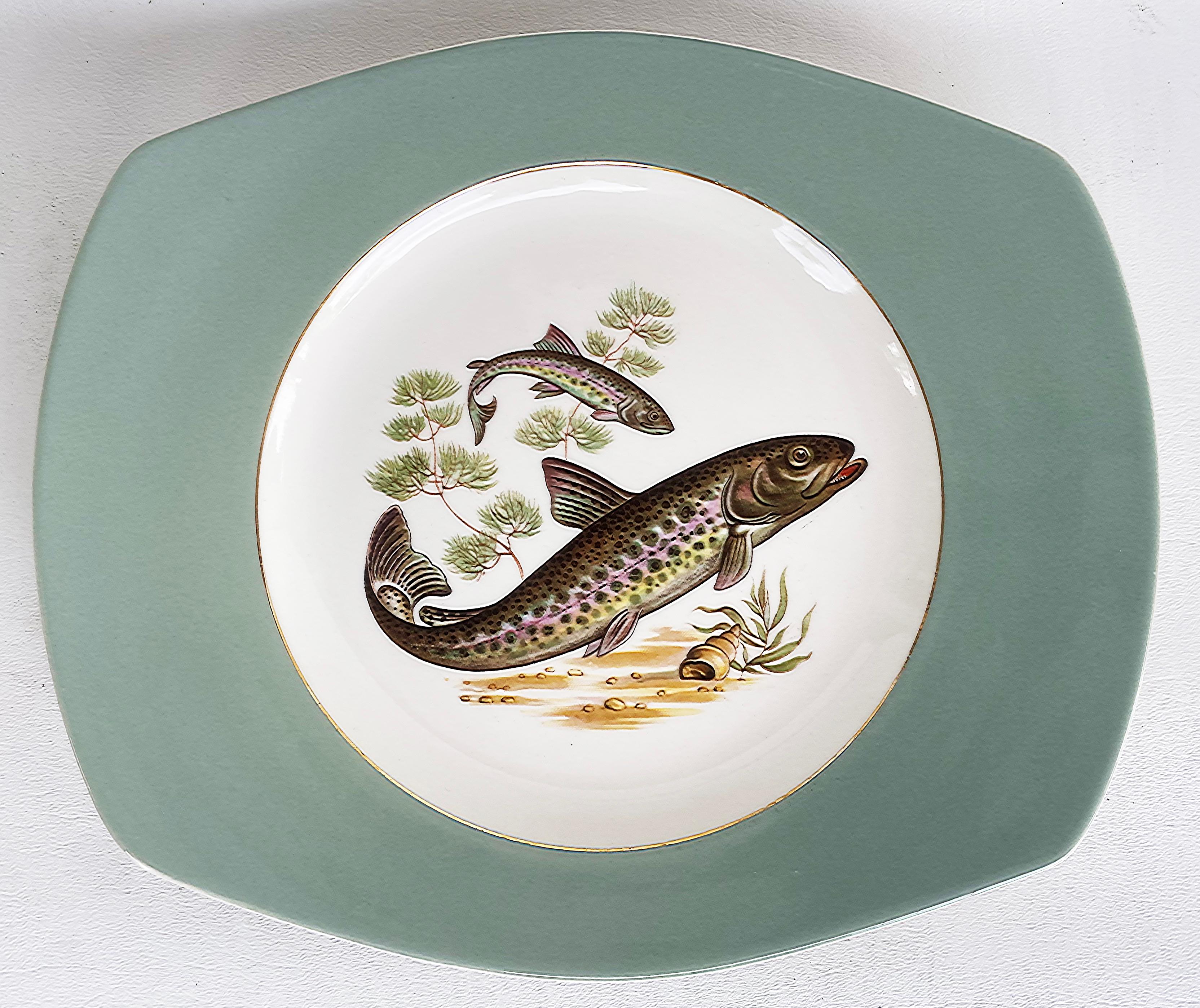 Figgjo Flint Norwegian Fish Service, Platter and 12 Plates, Mid-20th C

Offered for sale is a set of 12 dining plates and a companion serving platter with fish motifs on all. The set is Norwegian and manufactured by Figgo Flint.  The plates and the
