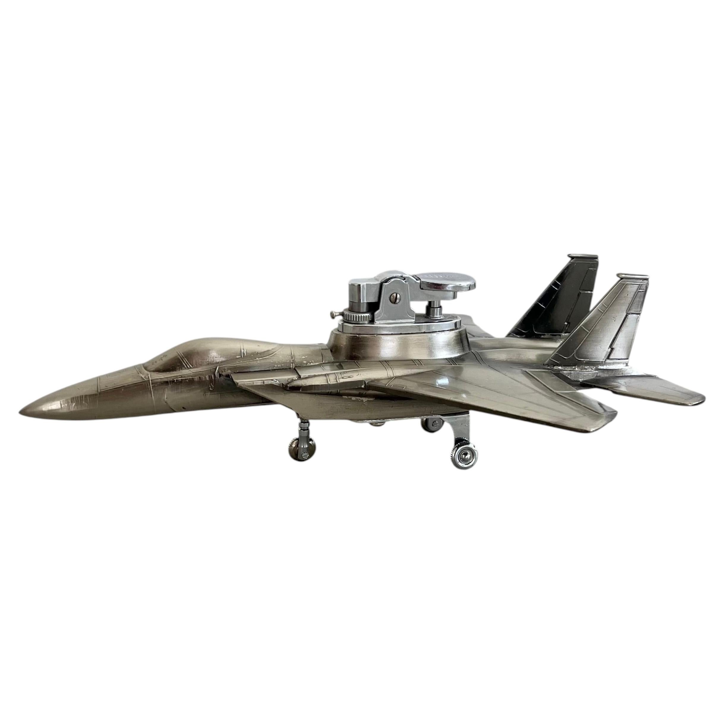 Encendedor de mesa con forma de avión de combate, Japón, década de 1970 en venta