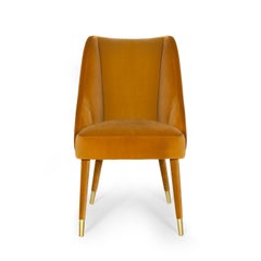 Organic nature-inspired velvet brass Figueroa dining chair by InsidherLand