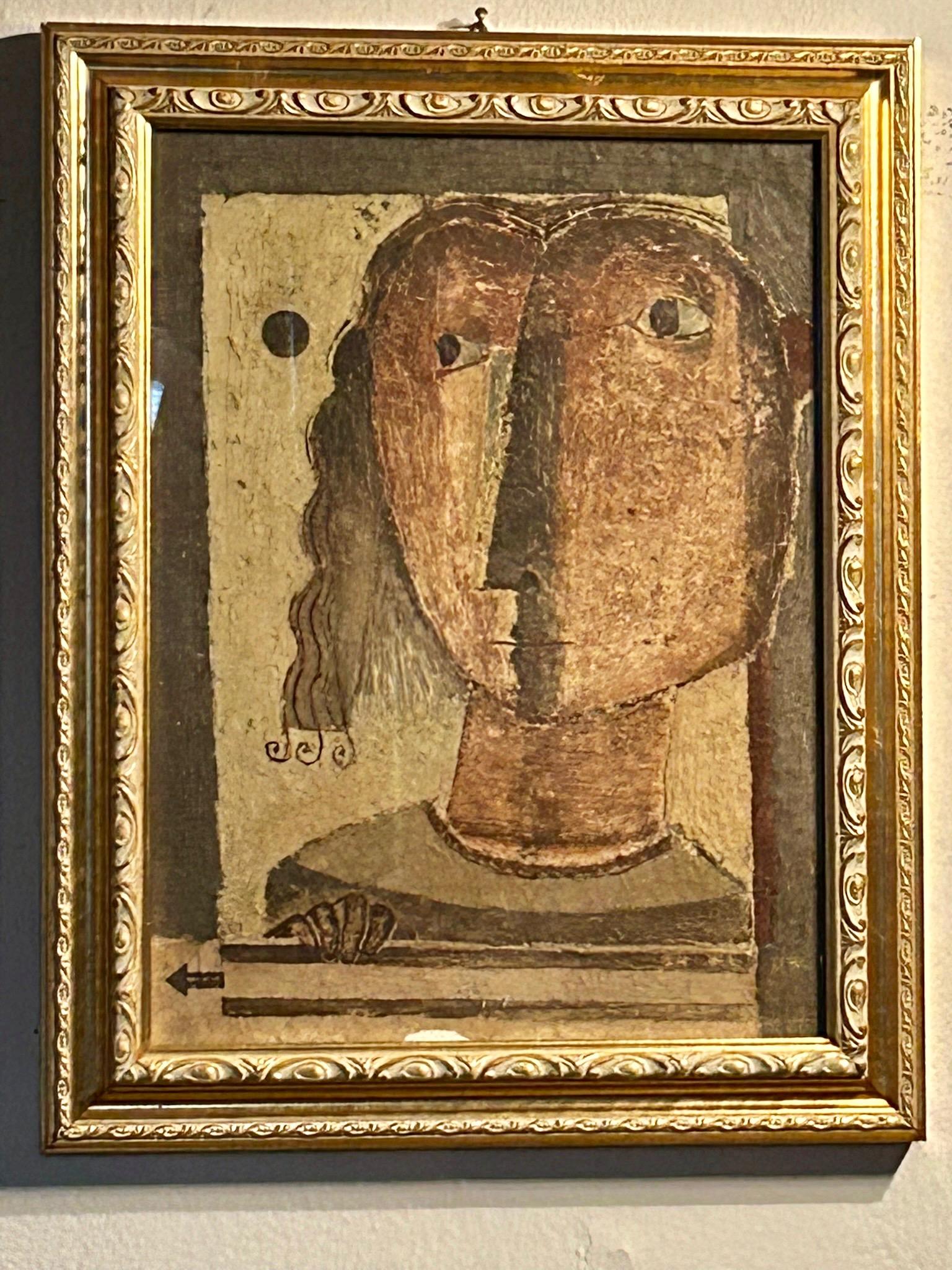 Un’opera raffinata di Antonio Mignozzi realizzata mediante una tecnica prossima all’affresco: terre e colle miscelate a pigmenti naturali danno vita a una superficie materica densa, evocativa di intonaci antichi. La figura frontale trattata con