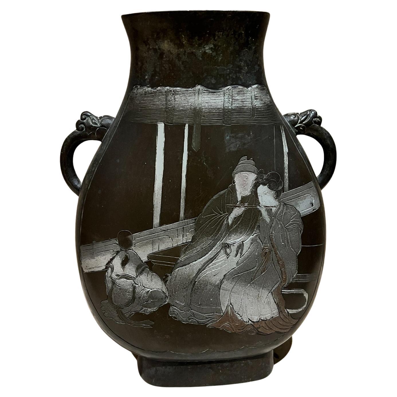 Vase asiatique figuratif en bronze Art double face