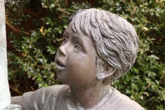Figural Bronze Mailbox of a Boy with Birds
