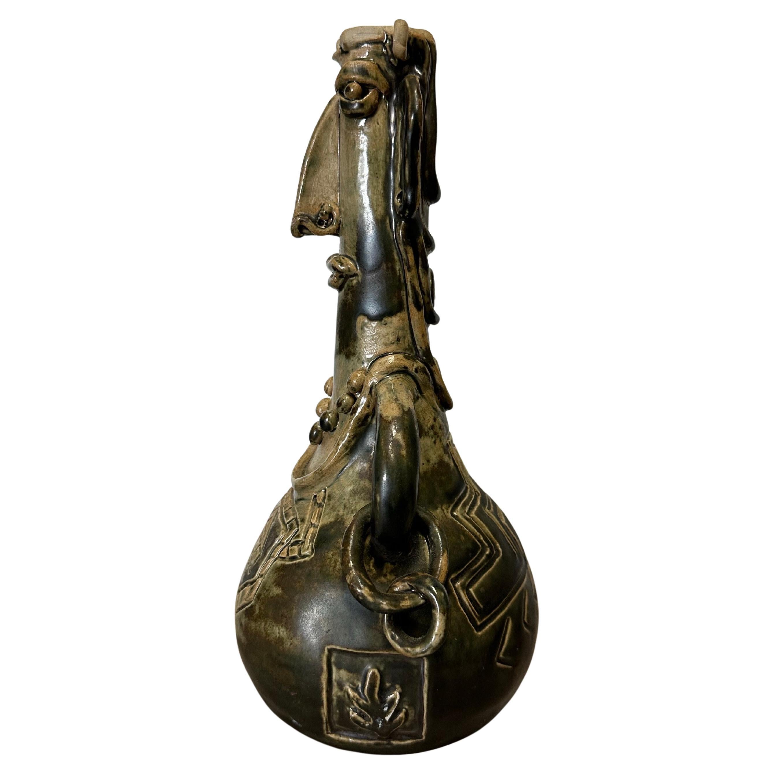 Figural Brutalist Art Pottery Face Jug/Vase Signed by Artist. An interesting figural brutalist art pottery jug/vase, circa 1970s. It is the bust of a man and has an abstract Picasso influenced look to it.  Very cool and different piece.  It is in
