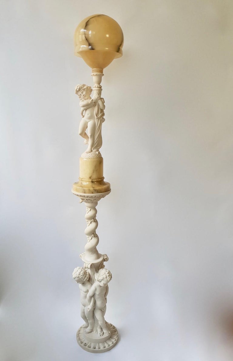 Giuseppe Bessi (1857-1922, Italy) carved alabaster sculpture table lamp - floor lamp on a column. Signed on the back “Prof. G. Bessi”, has a single socket in the interior and is in good overall condition with no repairs.
Measures: Total height 180