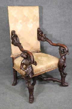 Fauteuil figuré en noyer baroque vénitien sculpté de style Andre vers 1890