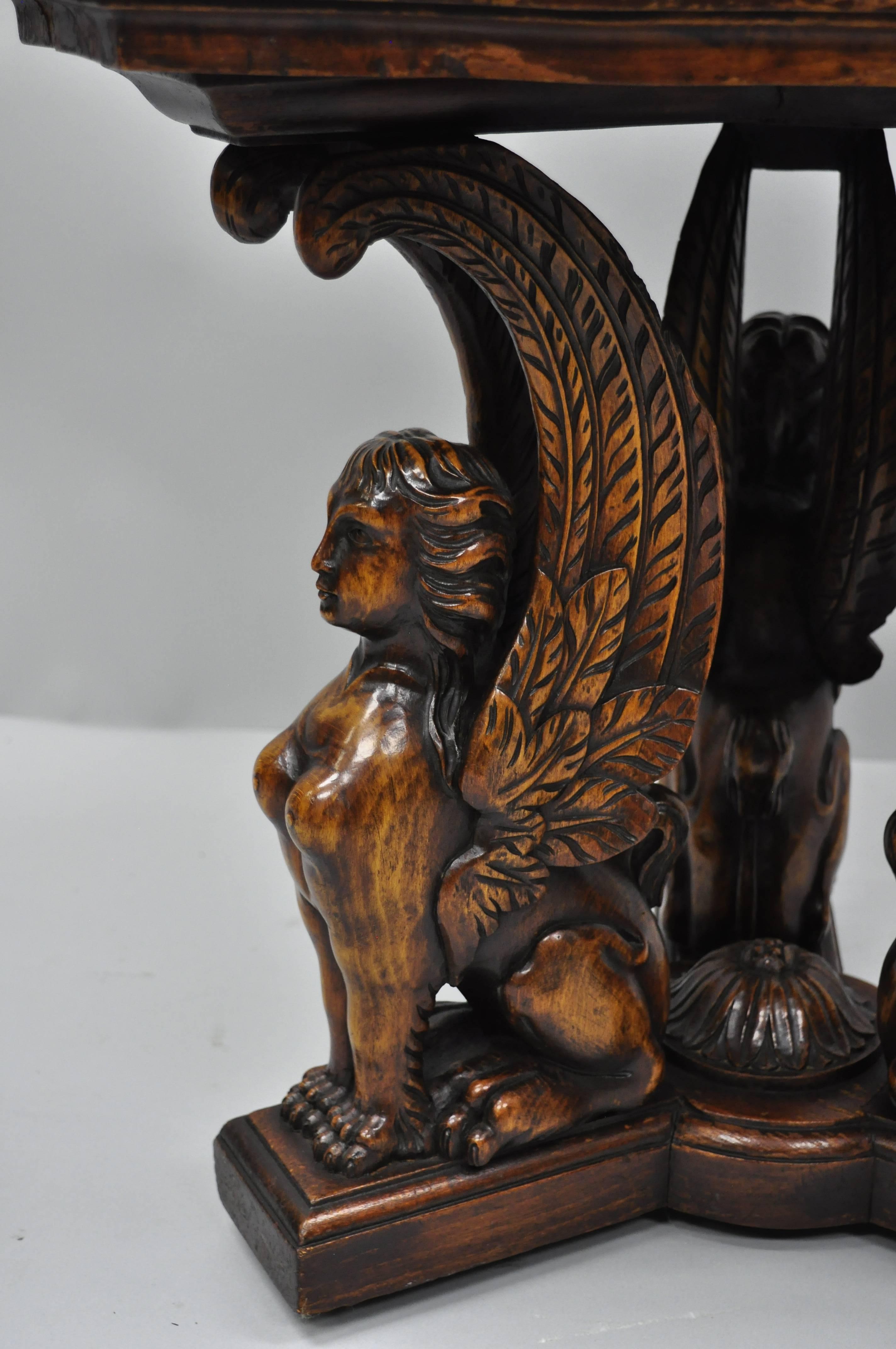 European Figural Carved Walnut Winged Female Griffin Triangle Side Table Resin Inlay Top For Sale