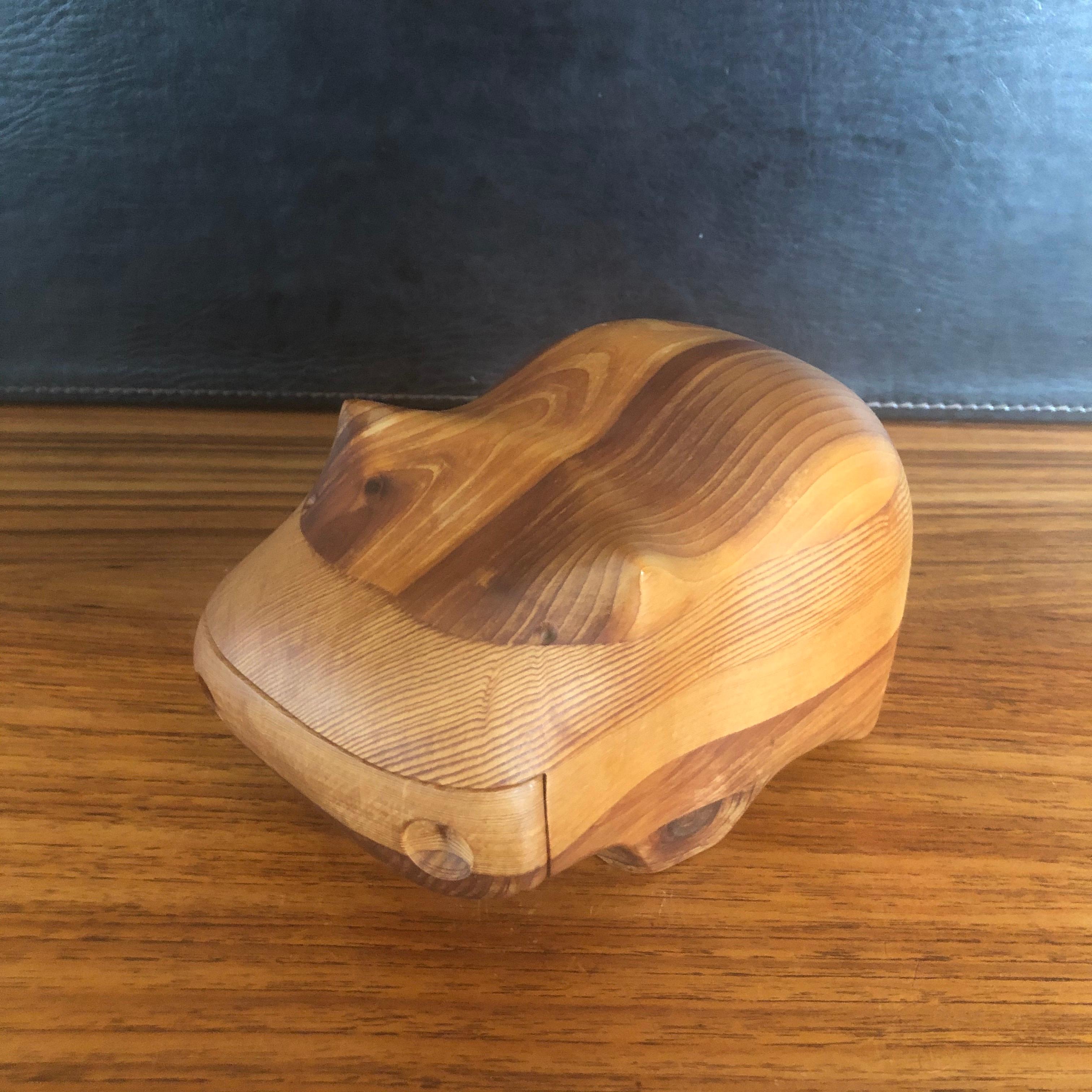 Figural hippopotamus cedar and pine trinket box by Deborah D Bump, circa 1970s. Incredible craftsmanship on this solid staved pine and cedar box designed, handcrafted and signed by the artist. 

  