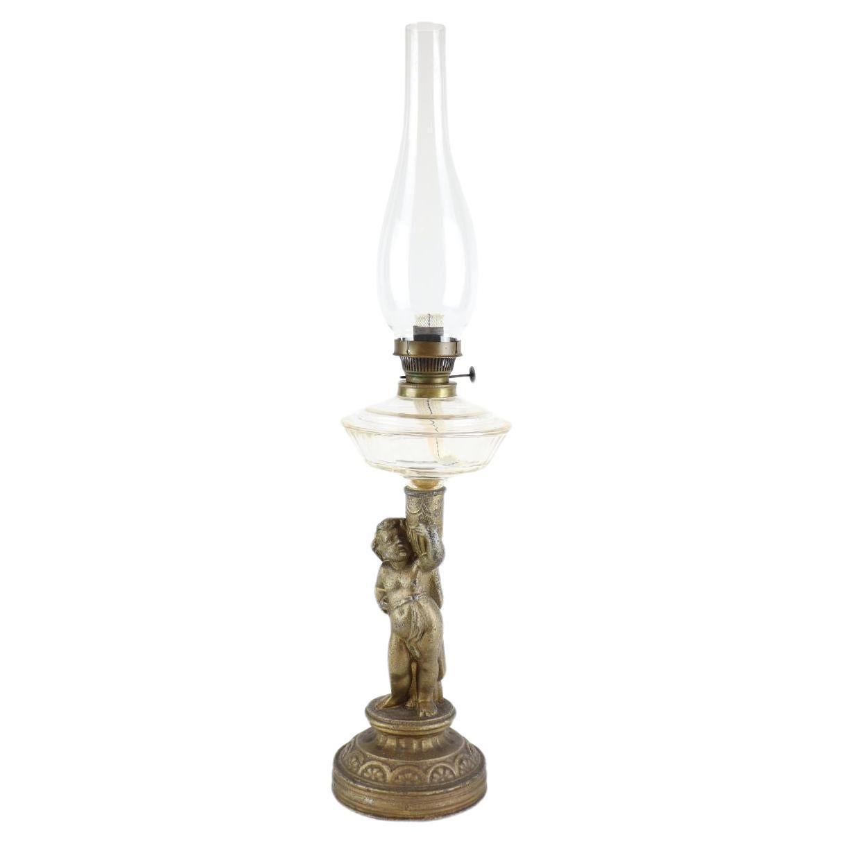 Kerosen-Tischlampe, R. Ditmar Wien, figurale Figur im Angebot