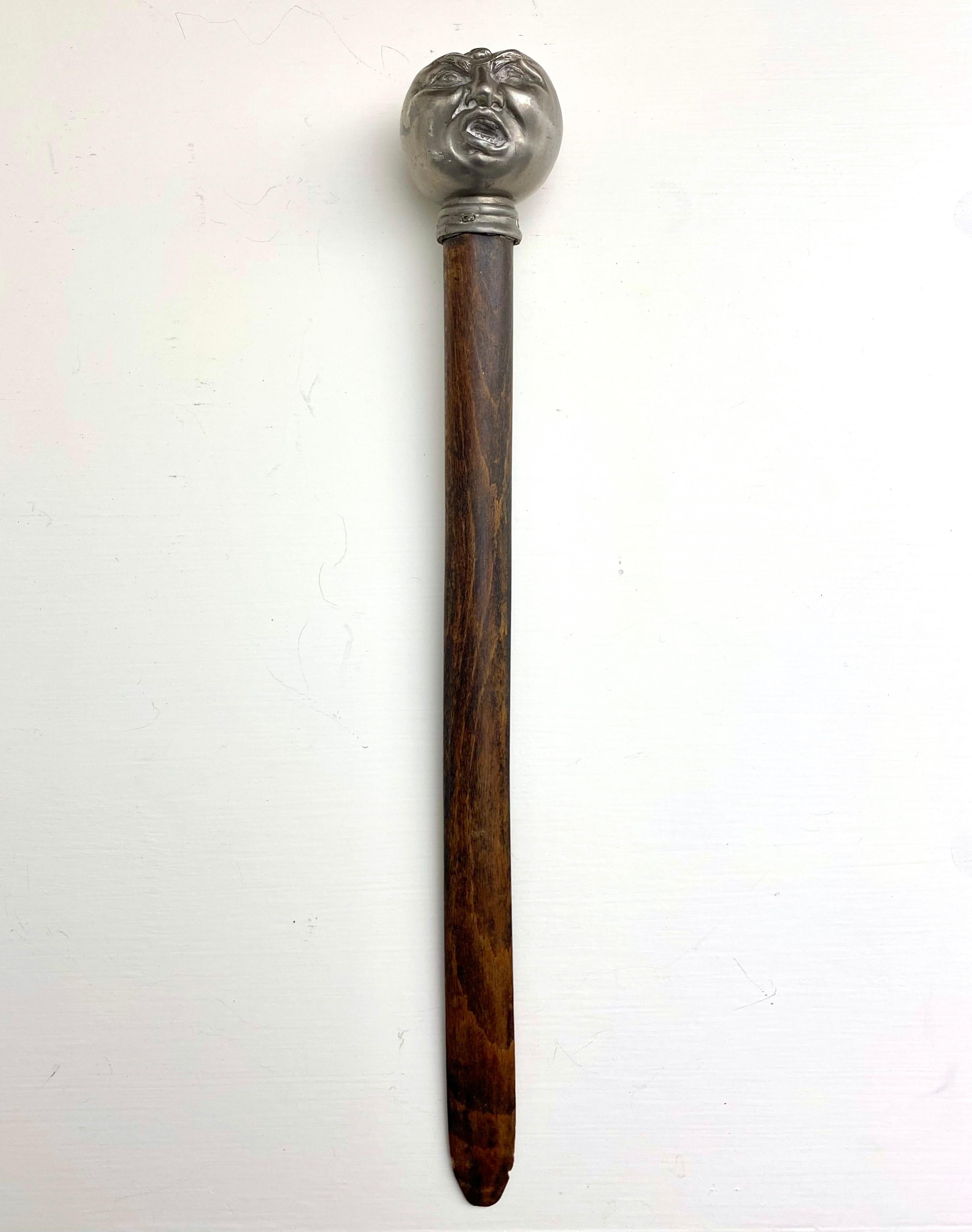 Fun and Whimsical antique figural letter opener of a man with a fly on top of his head. And that face, truly a great expression and a piece of sculptural art! Most likely pewter or silver plate with a wooden opener. Great collectors item for home