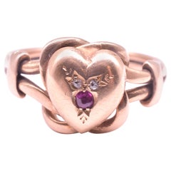 Figural Lover's Knot and Heart Ring with Diamonds and Rubies, HM 1902