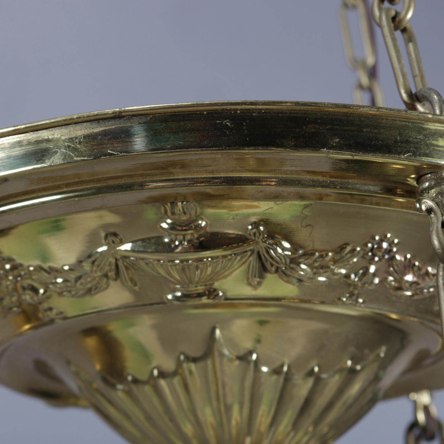 Embossed Figural Neoclassical Brass Ceiling Light Fixture with Floral Form Shades