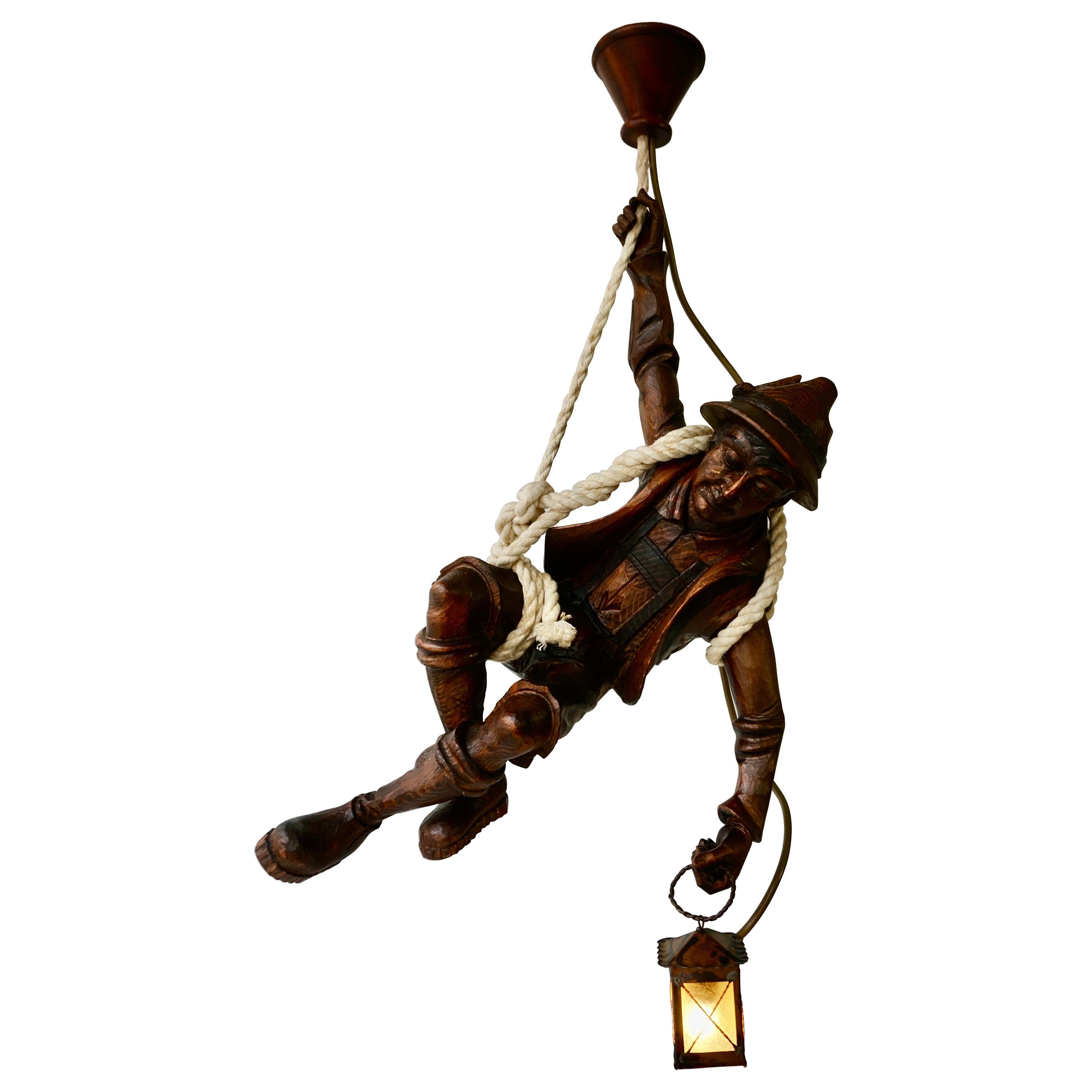 Figural Pendant Lamp of a Mountain Climber with a Lantern in Black Forest Style