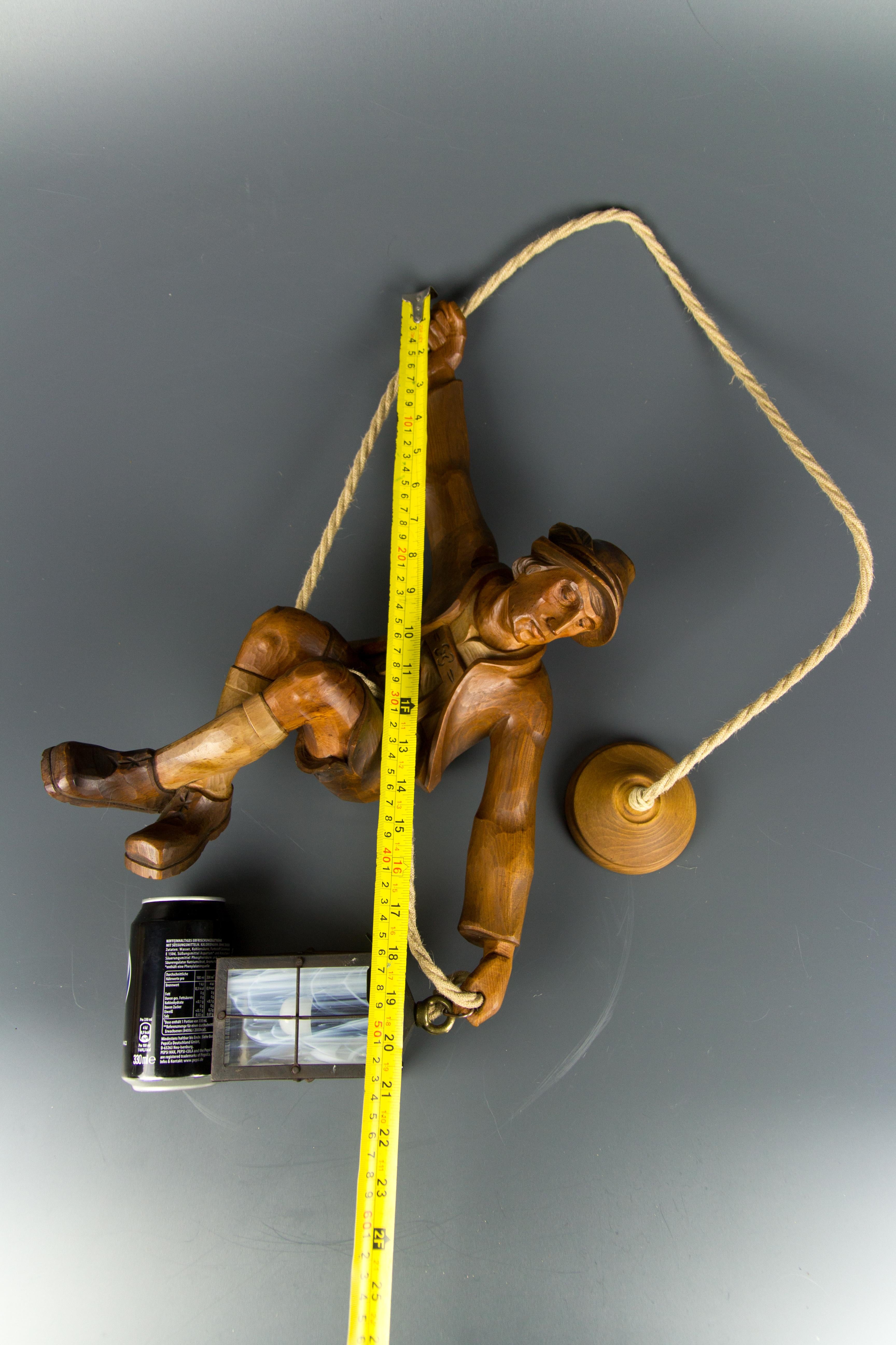 Figural Pendant Light of a Hand Carved Wood Figure Mountain Climber with Lantern 9