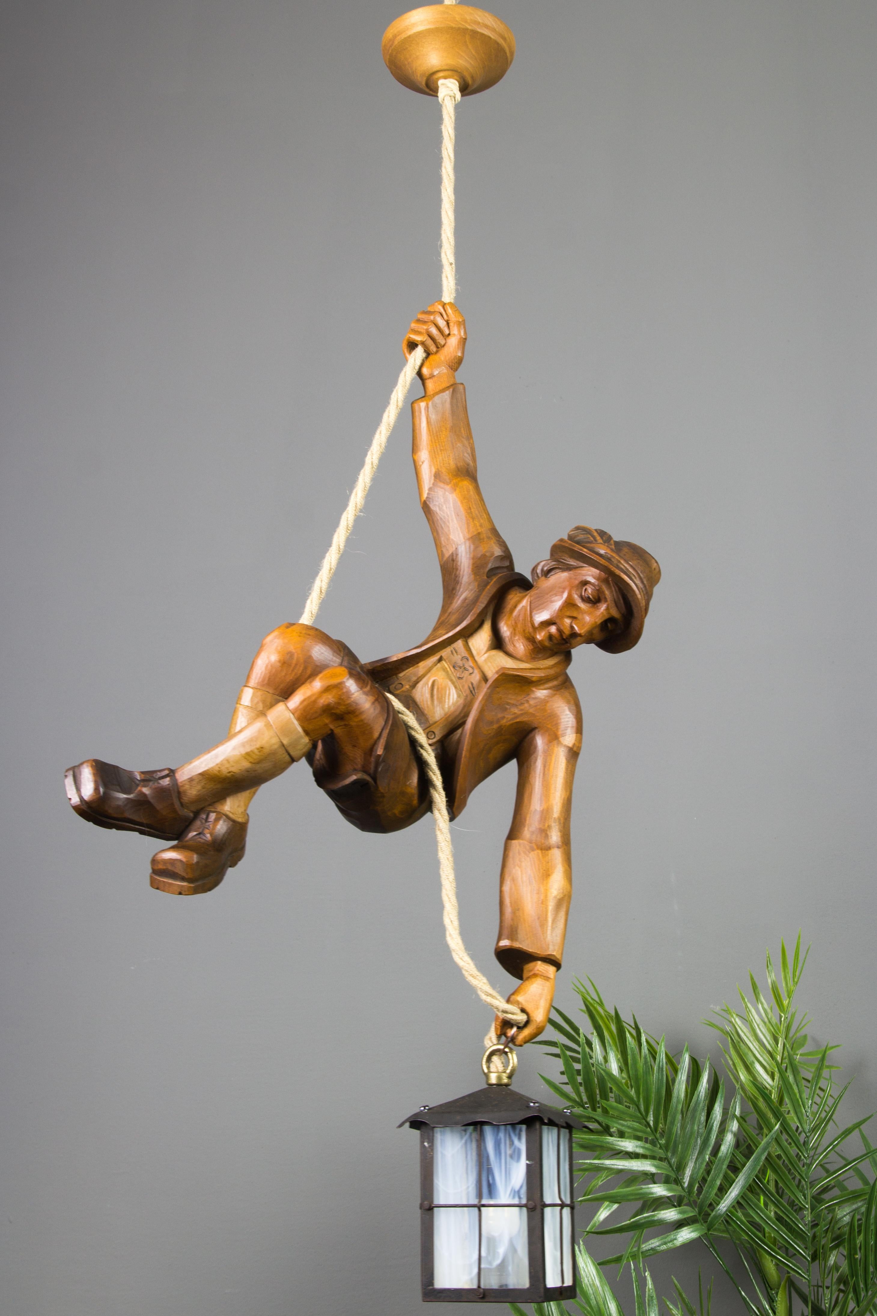 Black Forest Figural Pendant Light of a Hand Carved Wood Figure Mountain Climber with Lantern