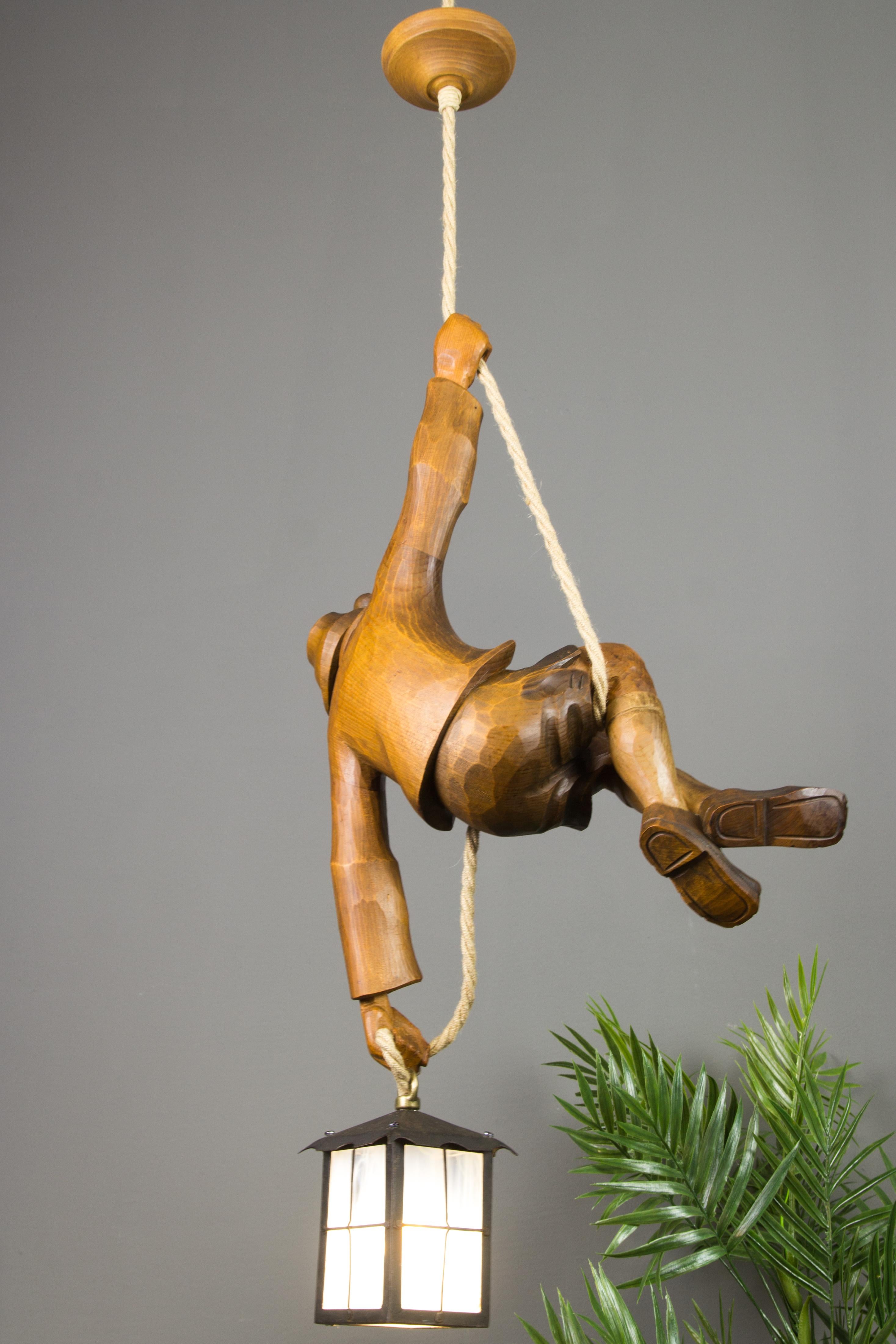 Figural Pendant Light of a Hand Carved Wood Figure Mountain Climber with Lantern In Good Condition In Barntrup, DE
