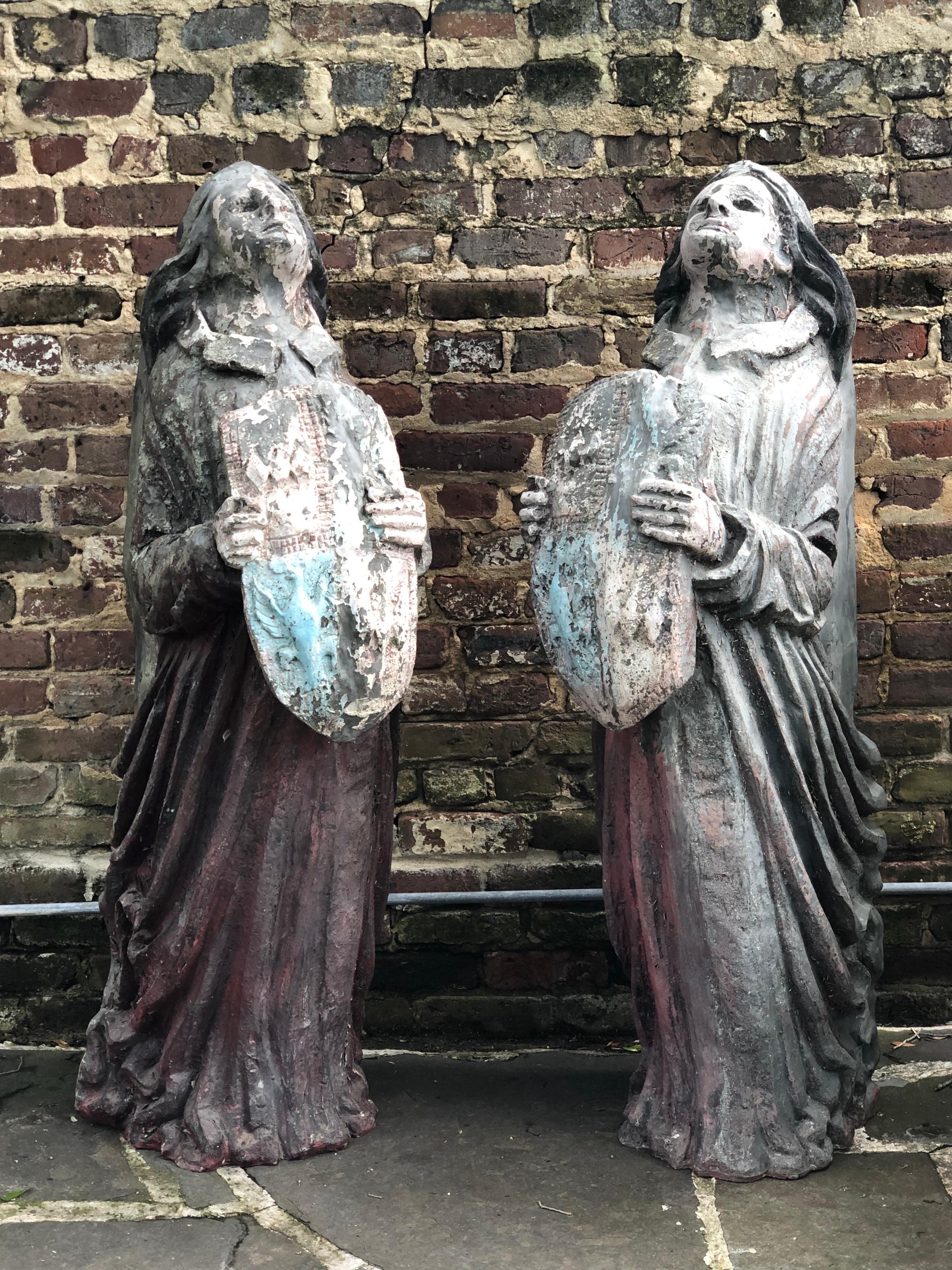 Two Graceful Garden Sculptures of Architectural Brackets / Nautical Figureheads. From a New York City Rooftop Garden with great Weathered Patina. Signed 
