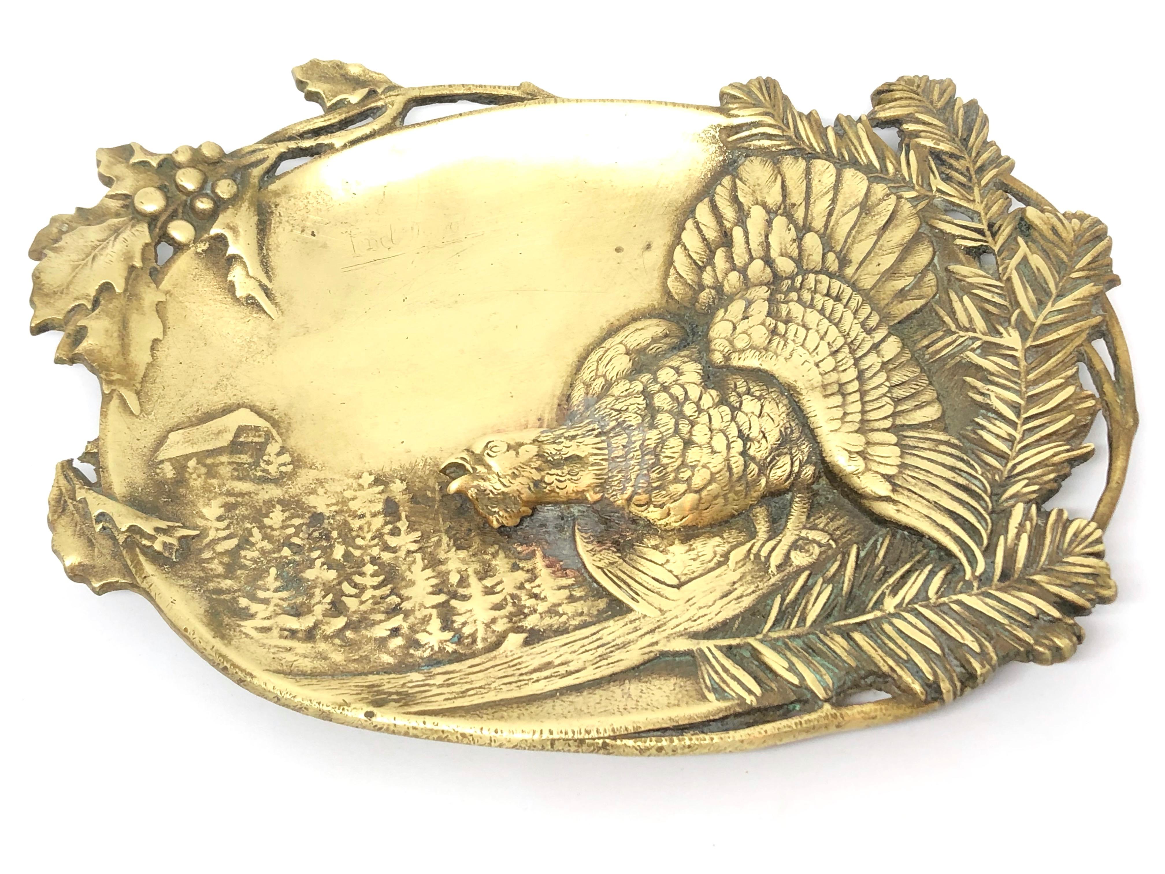 Gorgeous bronze figural catchall with a wood grouse and mountain motif . It's a beautiful piece for every sideboard or just for your desk. Made in the 1920s this beautiful decorative piece is an addition to every room.