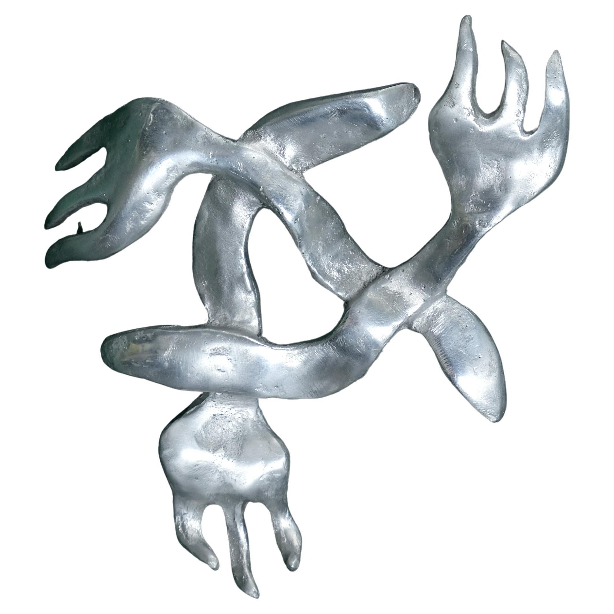 Figurative abstract forky aluminium cast wall sculpture or buckle For Sale