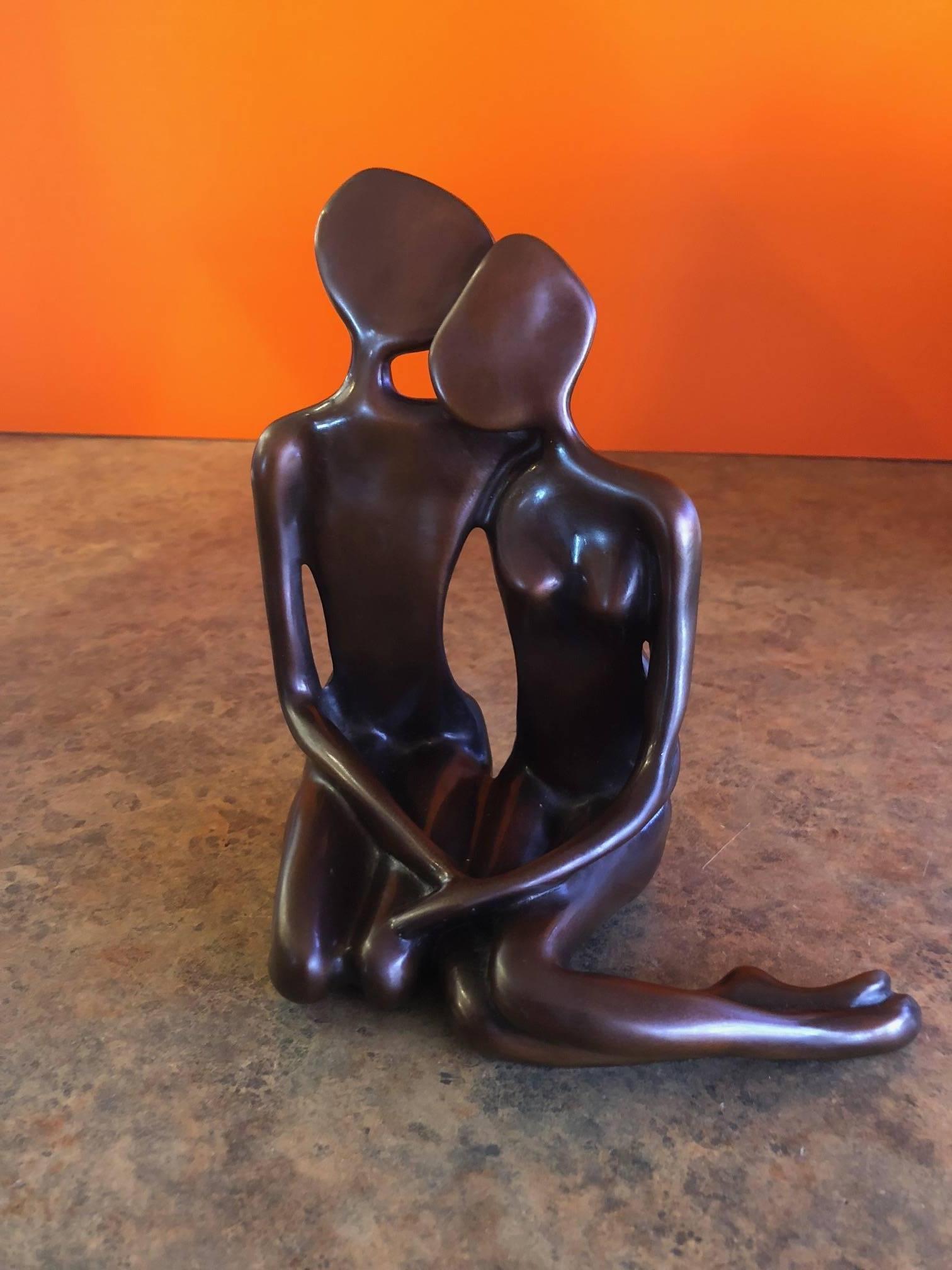 Figurative bronze sculpture entitled 