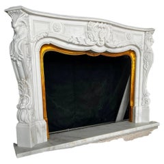 Figurative Carved Marble Fireplace Mantel
