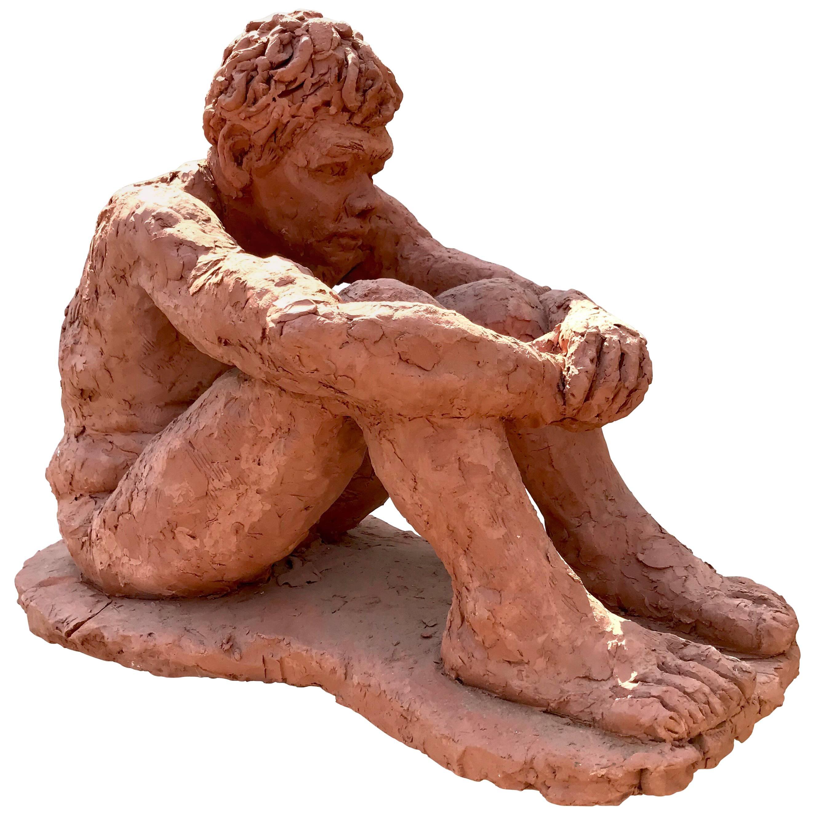 Figurative Clay Sculpture of a Seated Man For Sale