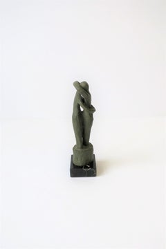 Sculpture masculine et féminine, vers 1960