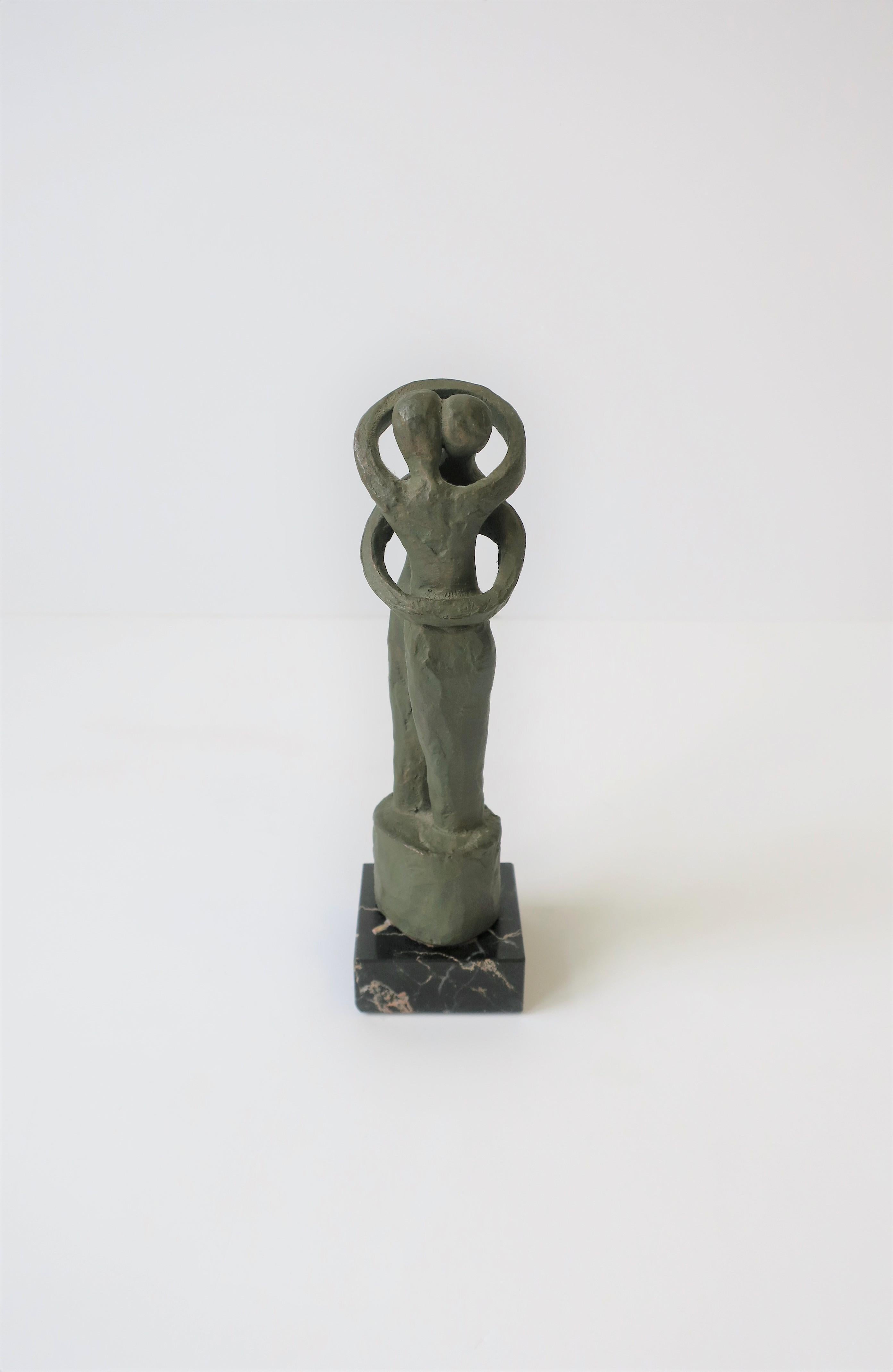 American Male and Female Sculpture on Black Marble Base, circa 1960s For Sale