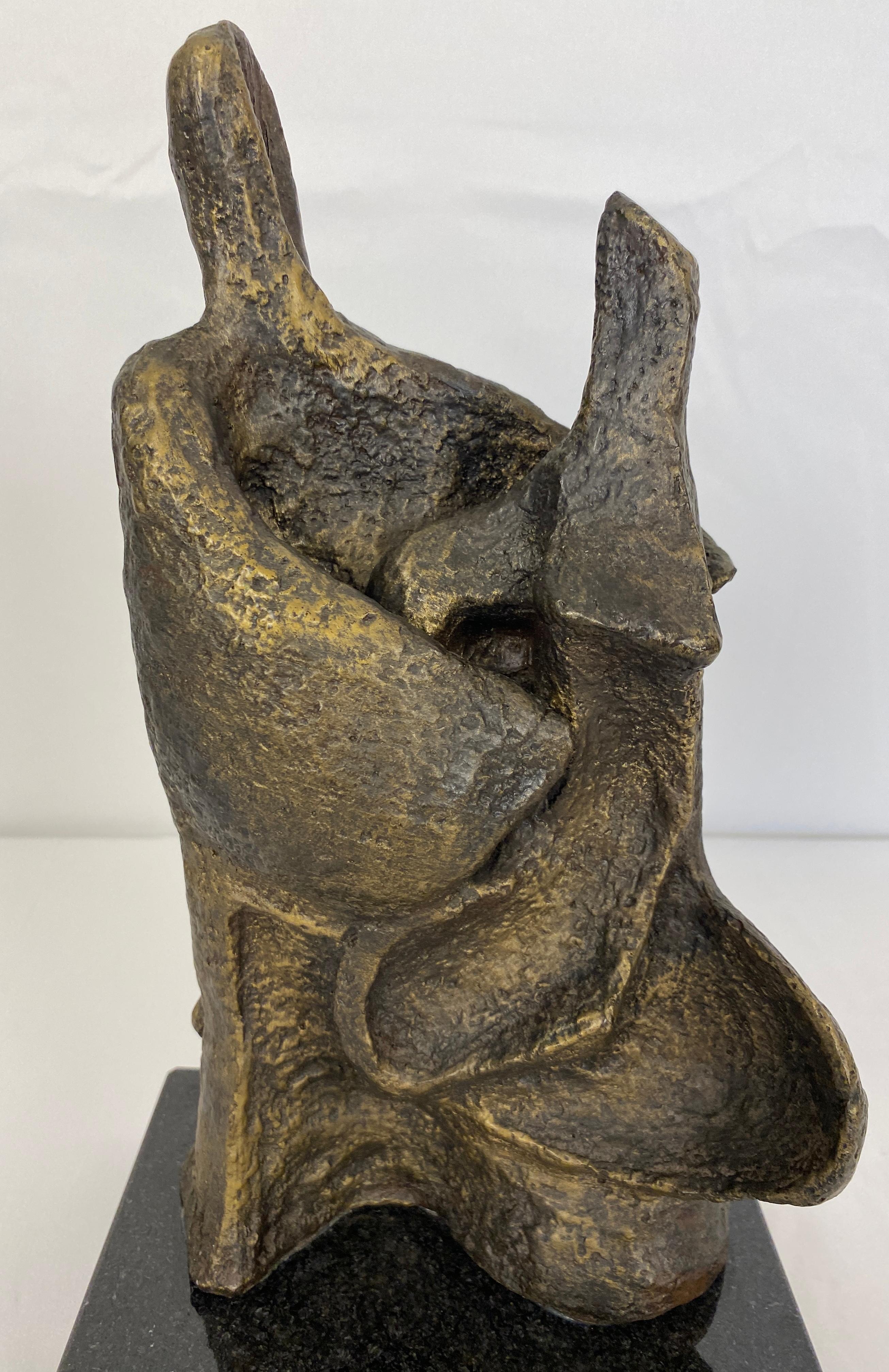 Beautiful and interesting form in this Brutalist sculpture depicting a couple dancing. Classic modernist sculpture, well executed.

This mid-century modern figurative sculpture will enhance any contemporary or modern setting.  Stunning details.
