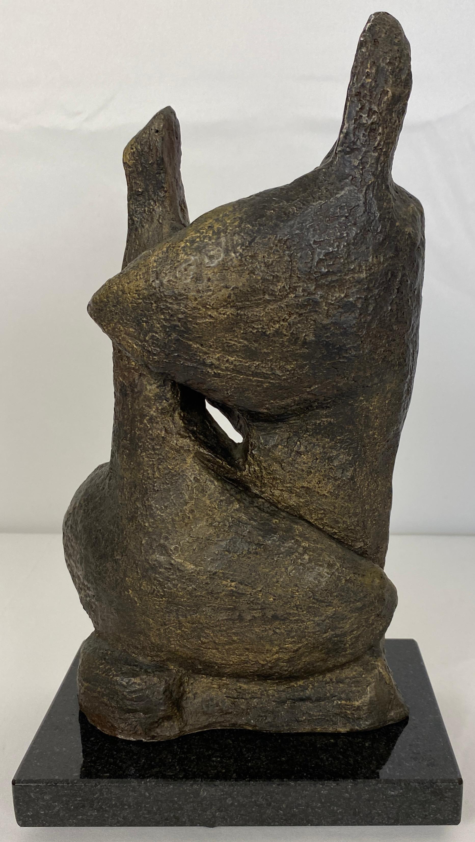 Hand-Crafted Mid-Century Modern Figurative Composite Sculpture Mounted on Black Marble For Sale