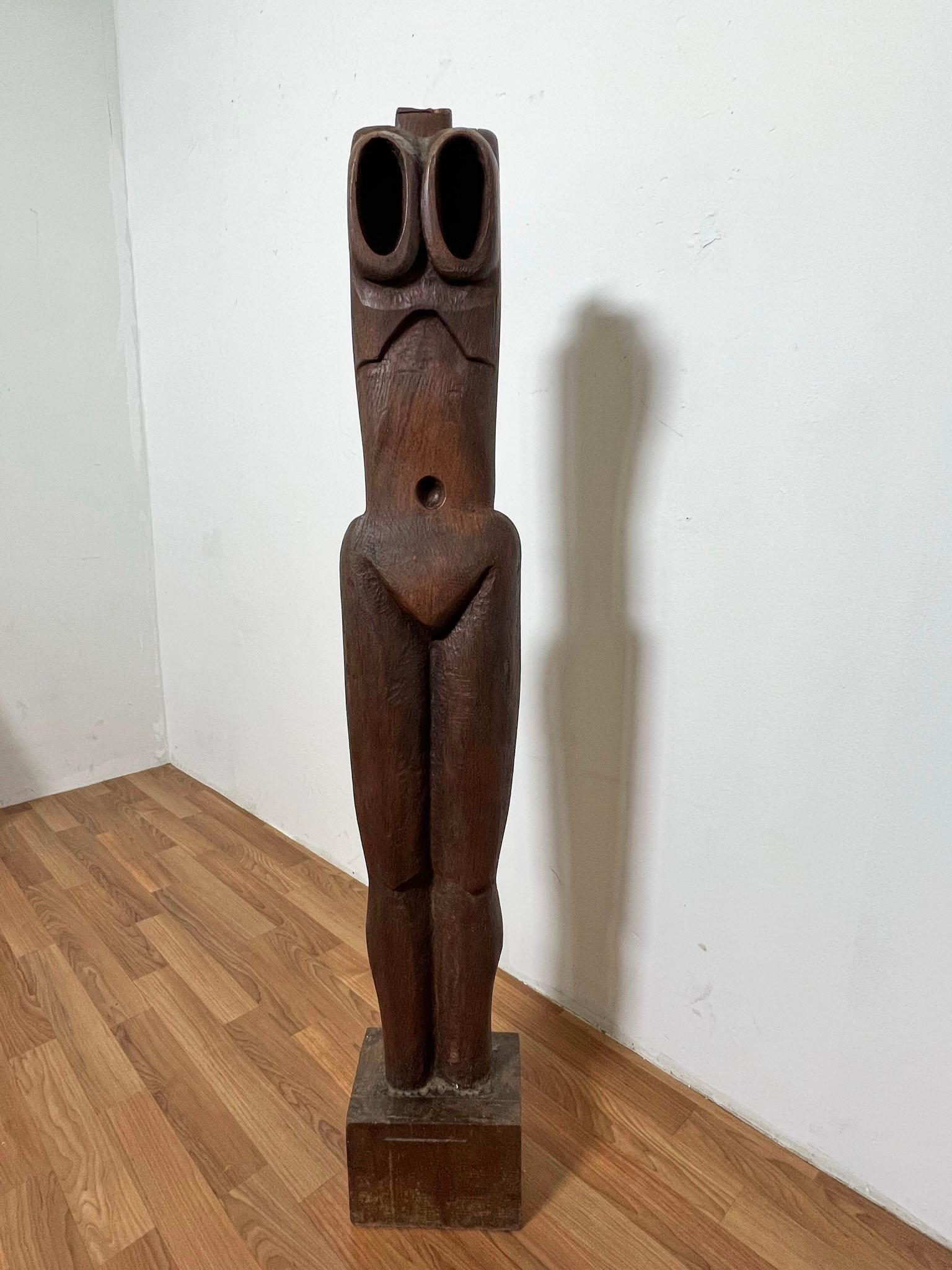 A modernist female totem, carved wood, by an unknown sculptor from the Montserrat College of Art, circa 1970s.