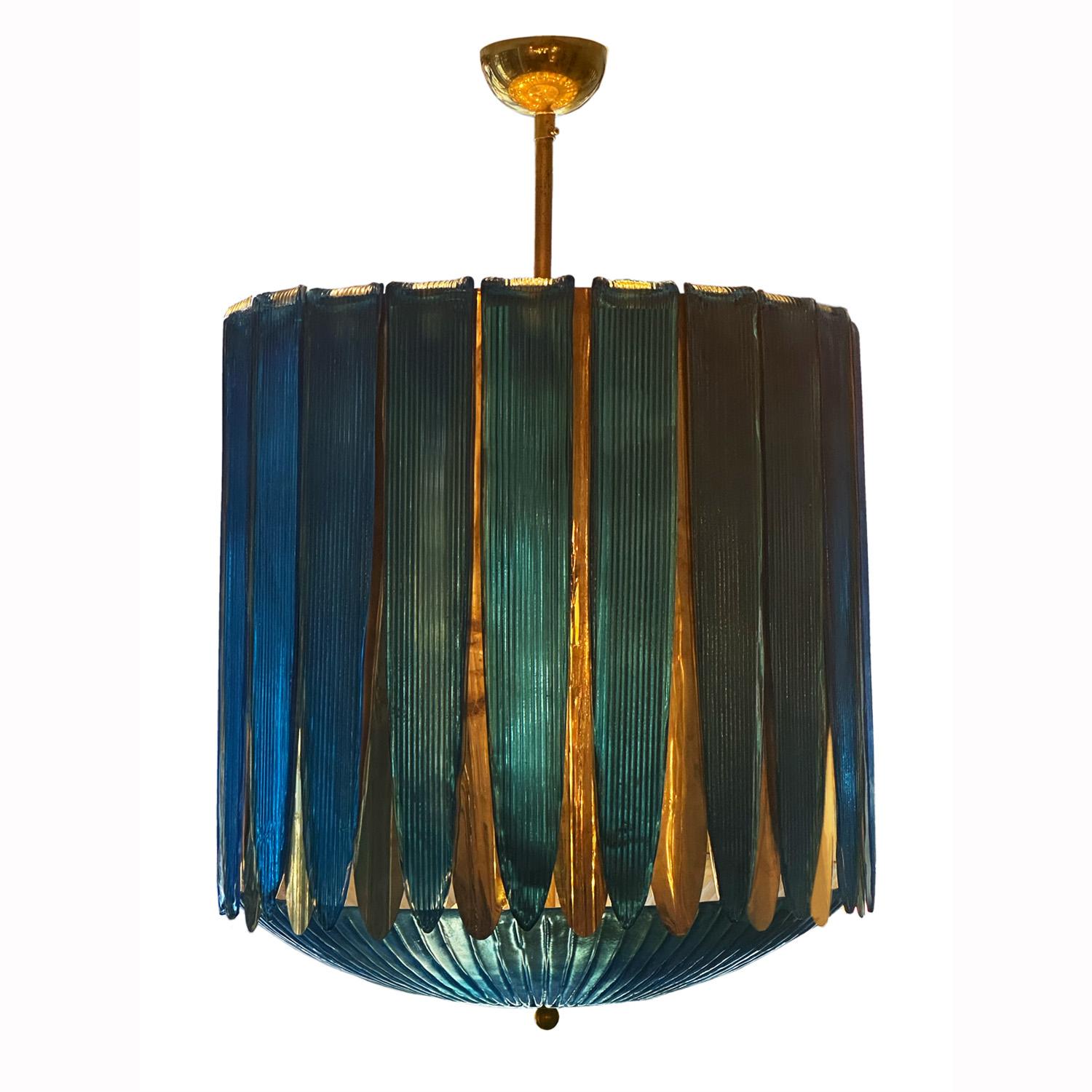 With its shimmering blue Murano glass and brass “festoons” and “bunting”, this whimsical  chandelier cuts the figure of an 18th century hot air balloon floating overhead.

Meticulously hand-crafted by a small artisanal workshop in Murano, Italy,