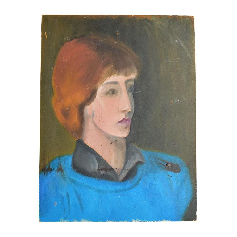 A portrait painting of a woman in blue on a masonite board. This piece is unsigned but was brought from the artists' residence. The subject wears a blue jumper with a dark collared shirt underneath. Her hair is brown, and upswept into a low bun. The
