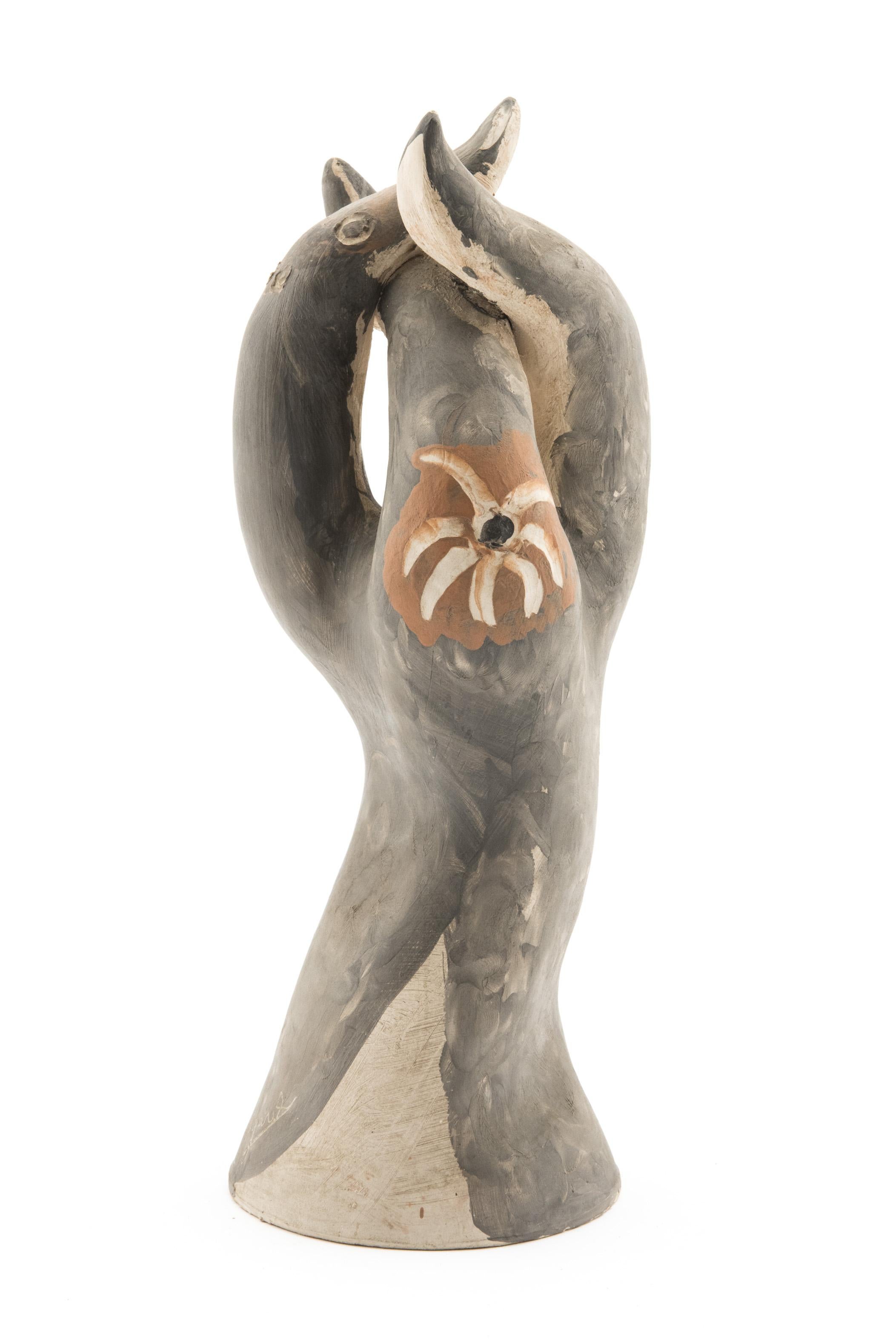 Abstract /figurative, could also be seen as a zoomorphic hand painted sculpture in terracotta by Jules Agard, 1950s, open at the bottom, interwind tentacles on top. 
Jules Agard did not necessarily want an exact description of his designs. What