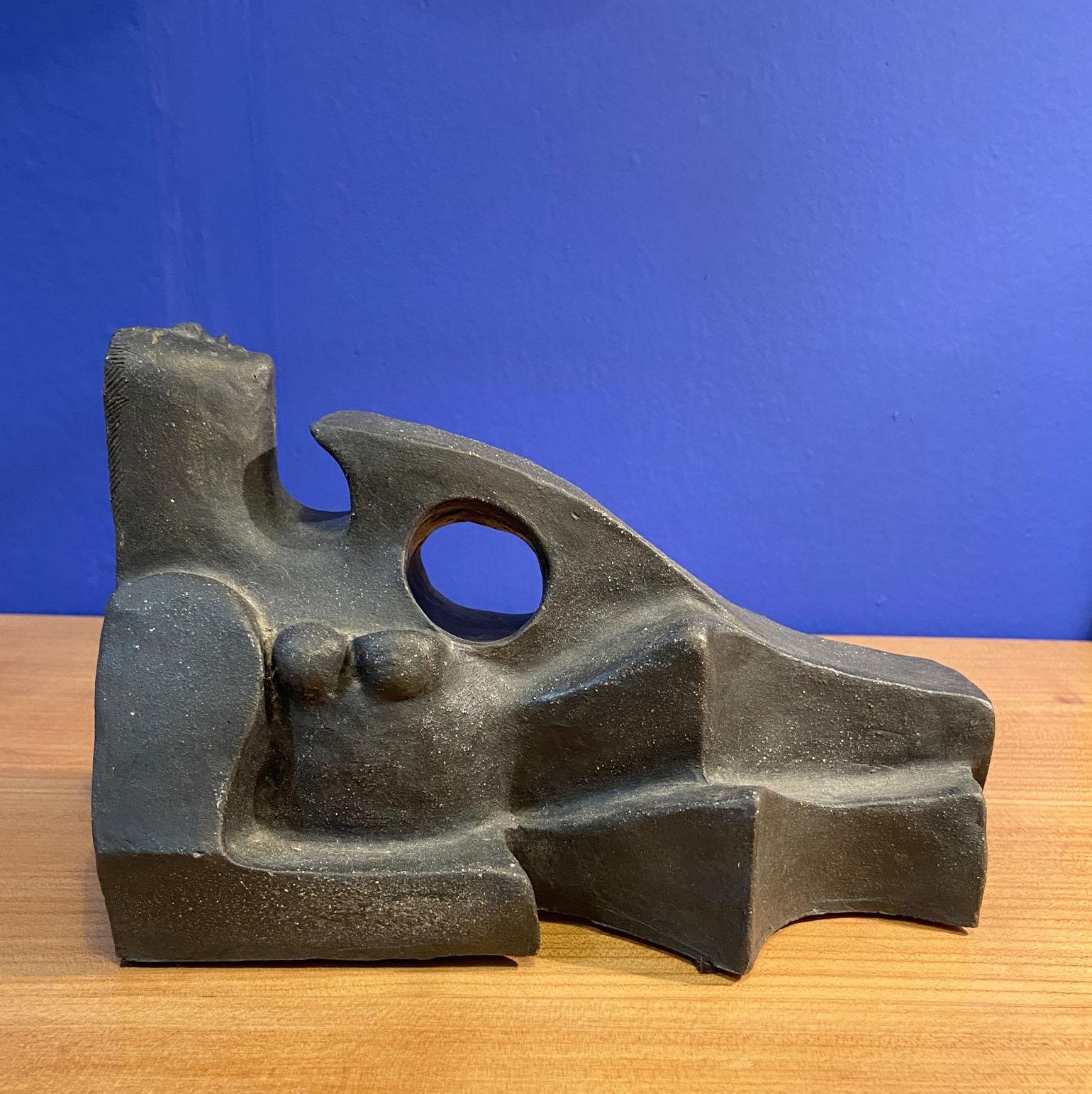 Cubist style handformed ceramic sculpture of a reclining women, Dutch 1970's. 