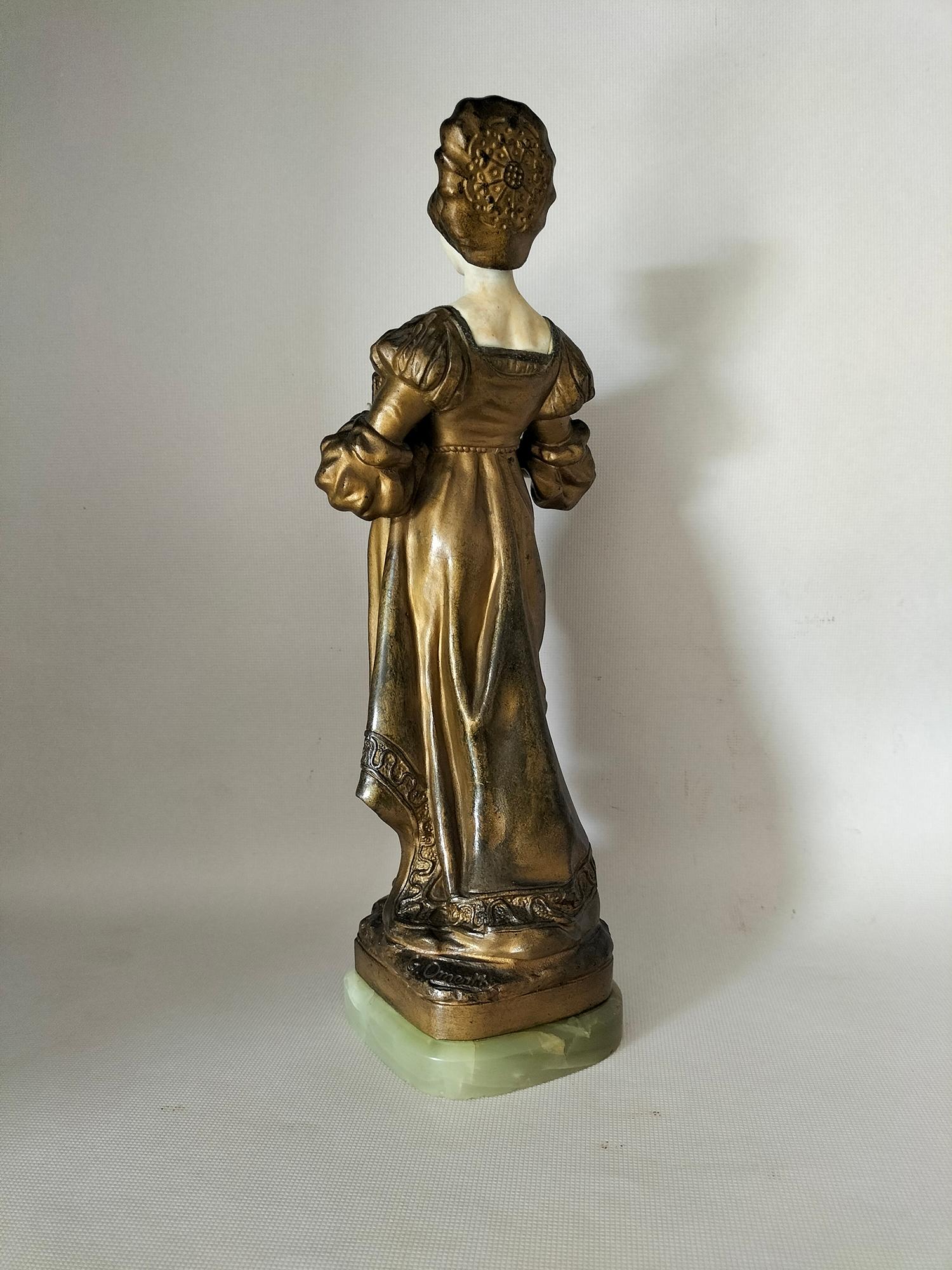 Figurative Sculpture in Calamine and Biscuit, Art Nouveau signed G. Omerth.  In Good Condition For Sale In Barcelona, Cataluna