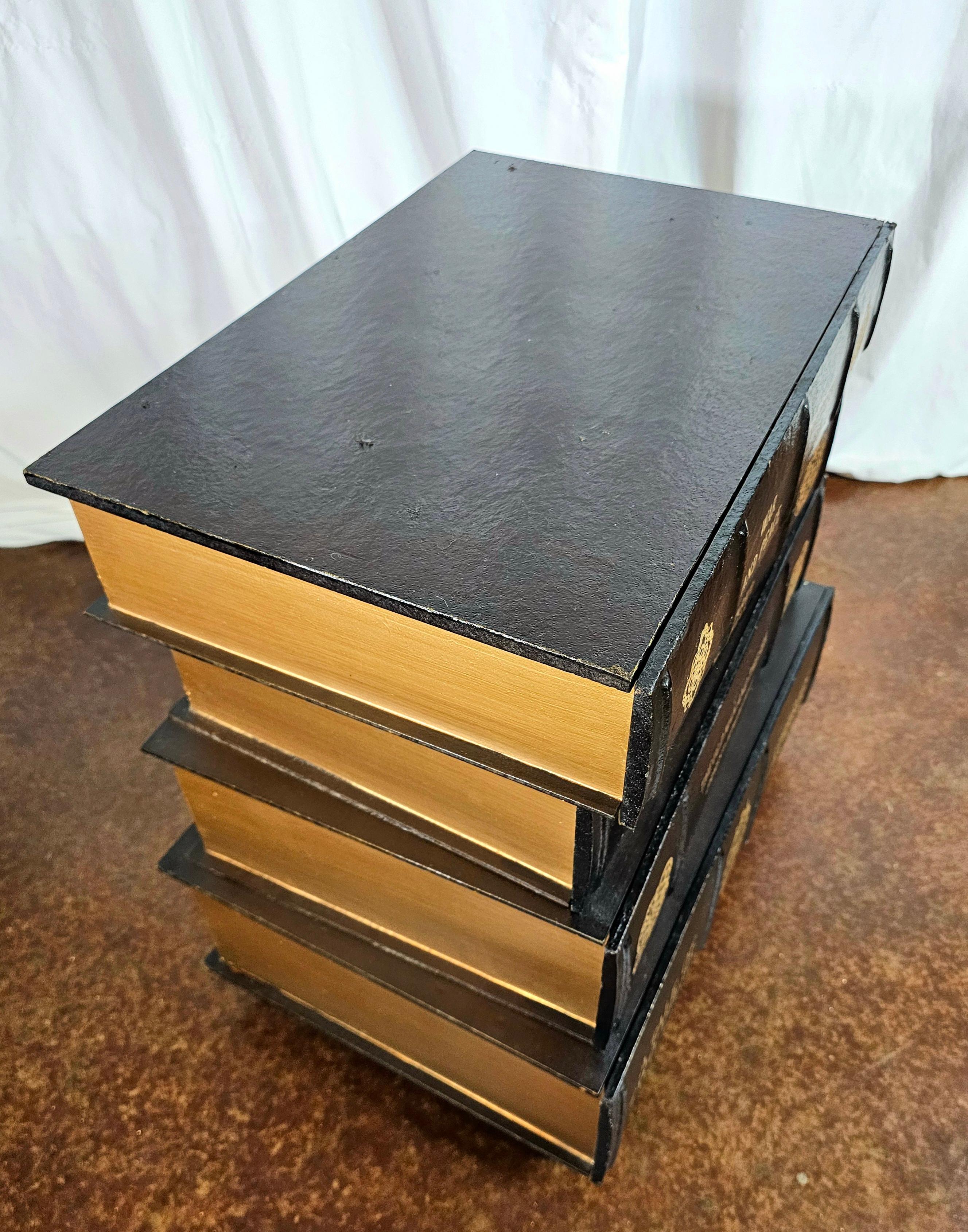 Vintage figurative stack of books end table. 
Adds charm and character to any room. 
Perfect for any bibliophile. 
Decorative book-design side table keeps remotes, reading materials and other items handy by your favorite chair.

4 drawers for