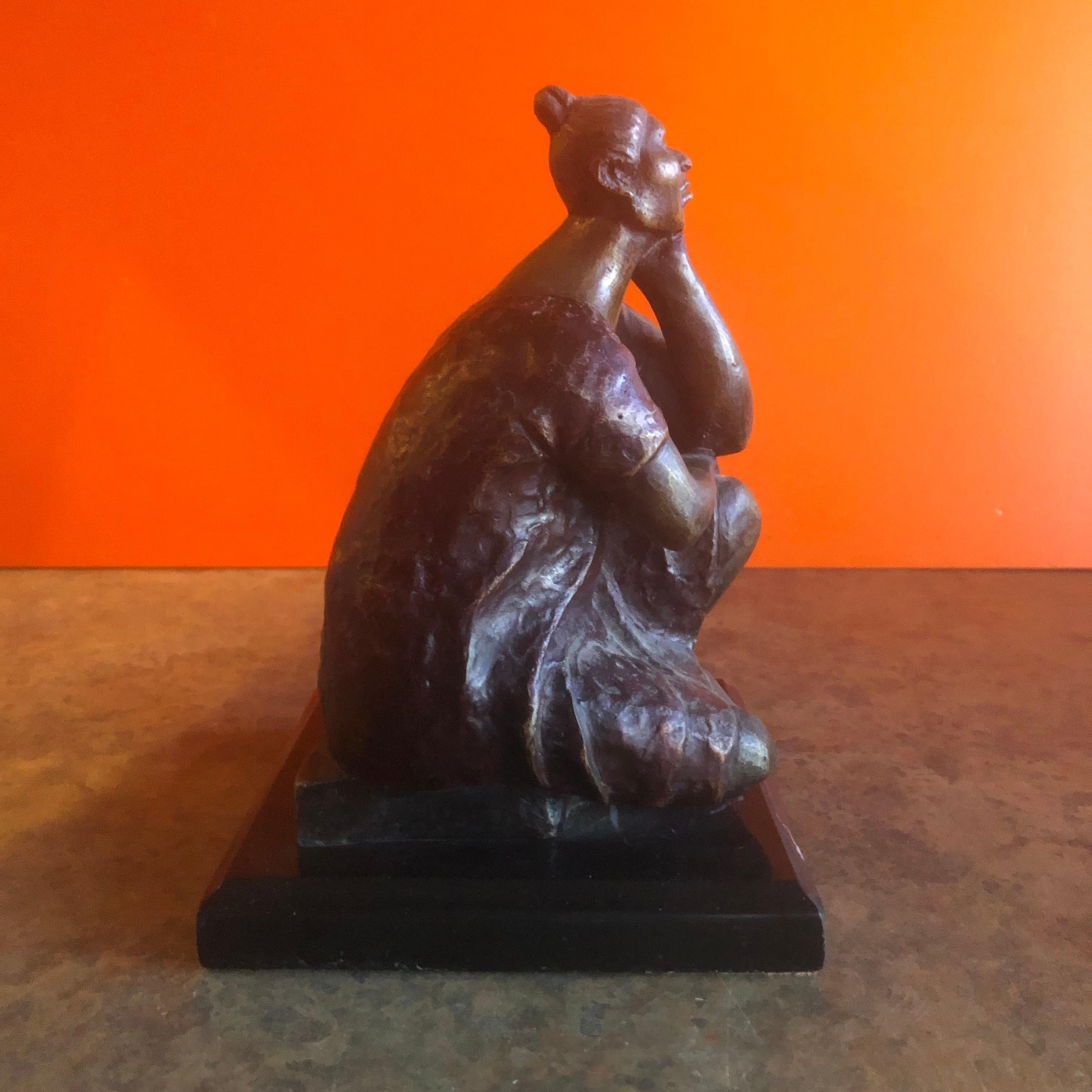 Heavy set figurative African American woman in bronze in the style of Colombian artist and sculptor Fernando Botero by Martin G., circa 1980s. The piece has polychrome patina and measures 5.875