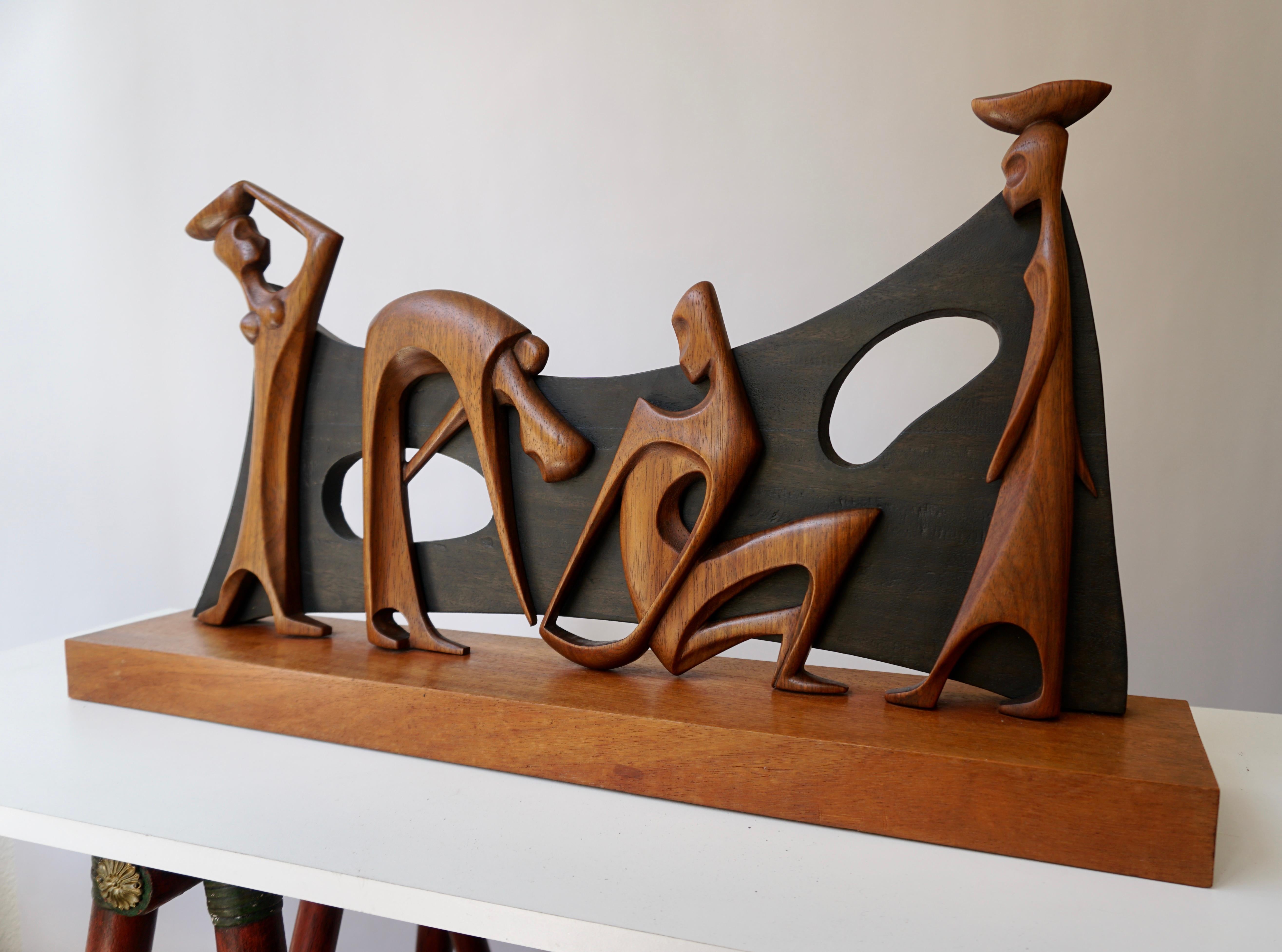 Hand-Carved Figurative Wooden Sculpture by F Tamba For Sale