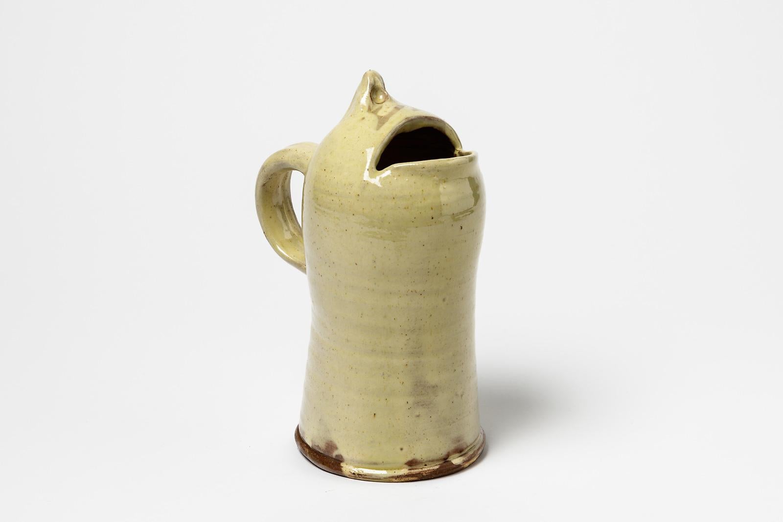 JJ Dubernard

Original and figurative ceramic pitcher

Yellow ceramic glaze color

Original perfect condition

Realised circa 2000

Measures: Height: 22cm, large: 15cm.