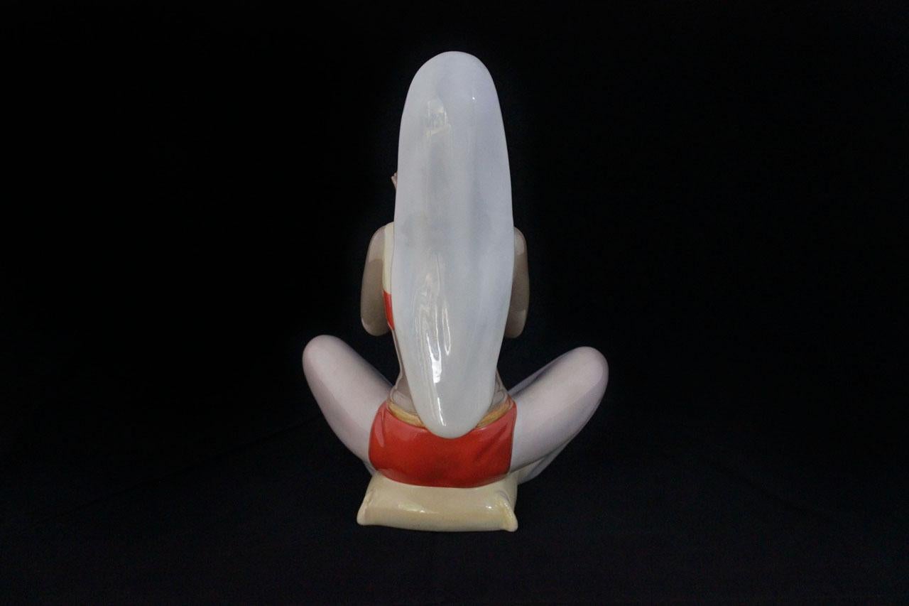 Figure of oriental girl in a meditative pose Turin 1940. Signed under the C.I.A. Manna Torino base. Published The Epigoni of the Lenci factory of Maria Grazia Gargiulo pag32.