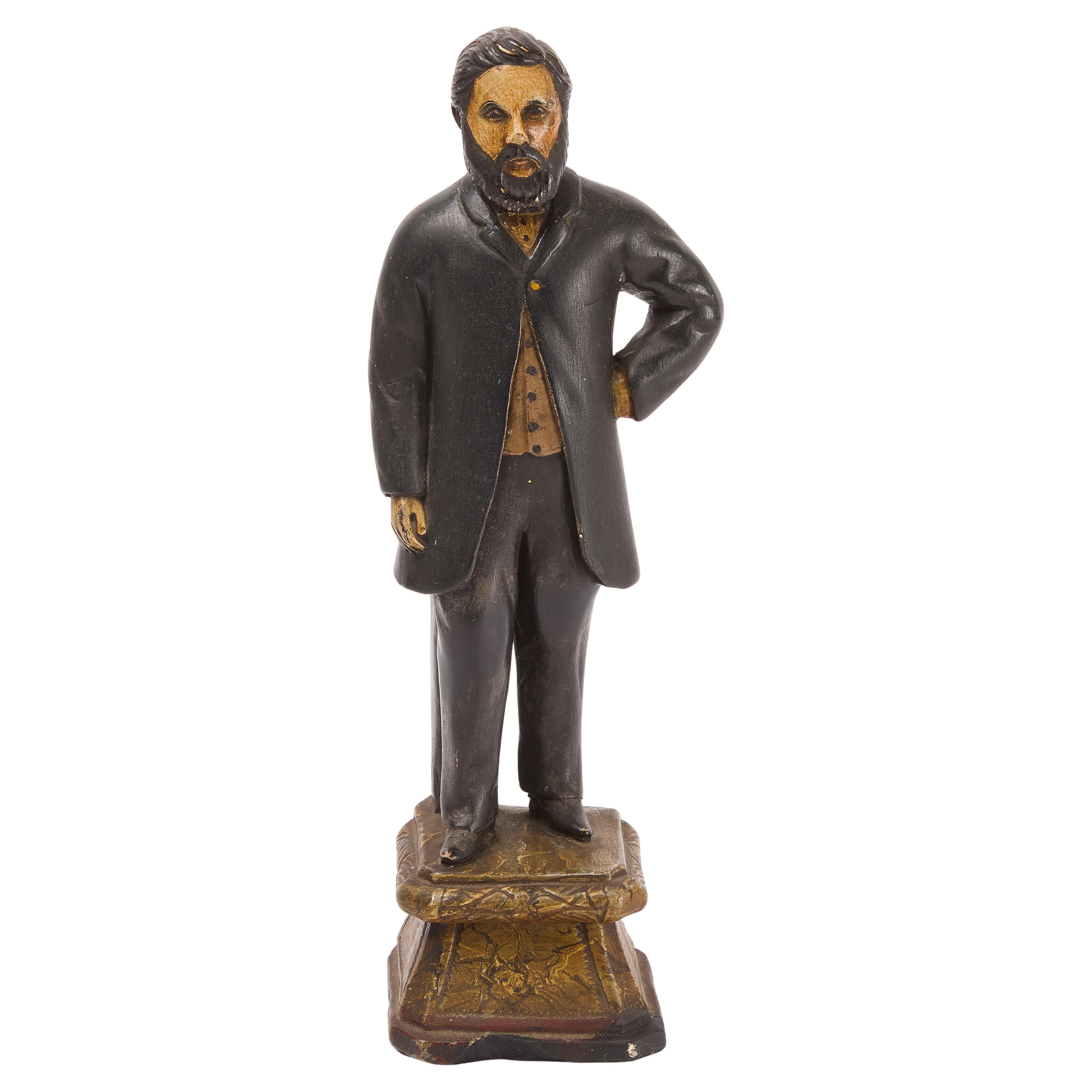 Figure d'un homme d'État. Grès peint