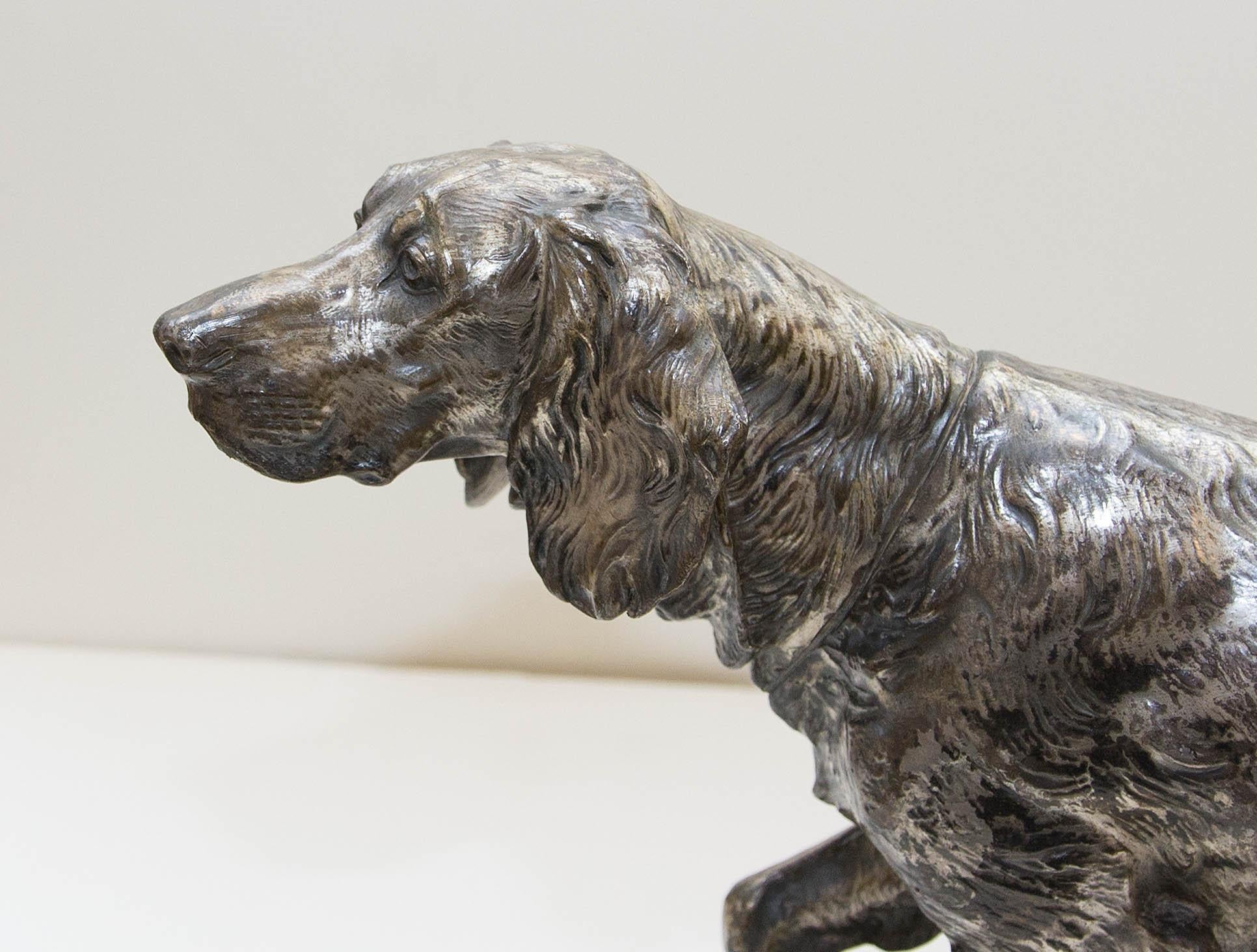 Spelter sculpture of an Irish setter on point. Nice detail and good size. Measures: 16