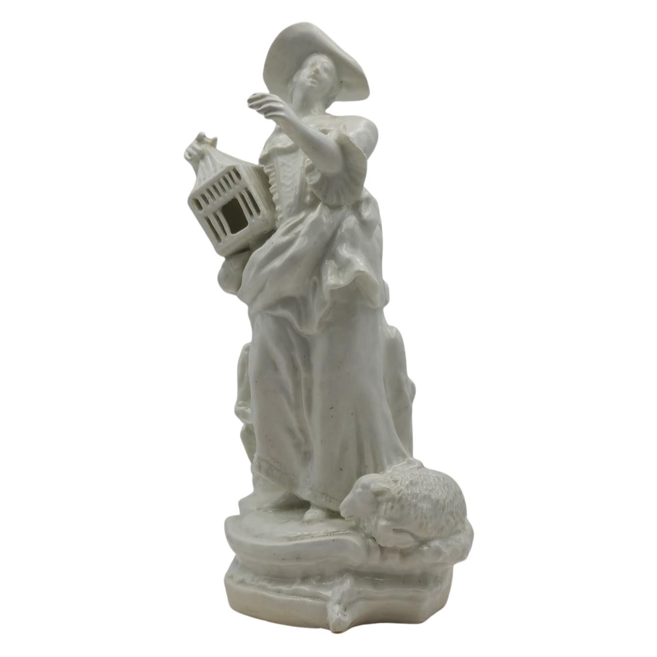 Una atractiva figura alegórica del Matrimonio, representada por una mujer con sus mejores galas, que sostiene una jaula.

La fábrica de Bow Porcelain fue la primera productora inglesa de porcelana; estas primeras obras son muy finas y muy raras.

Un