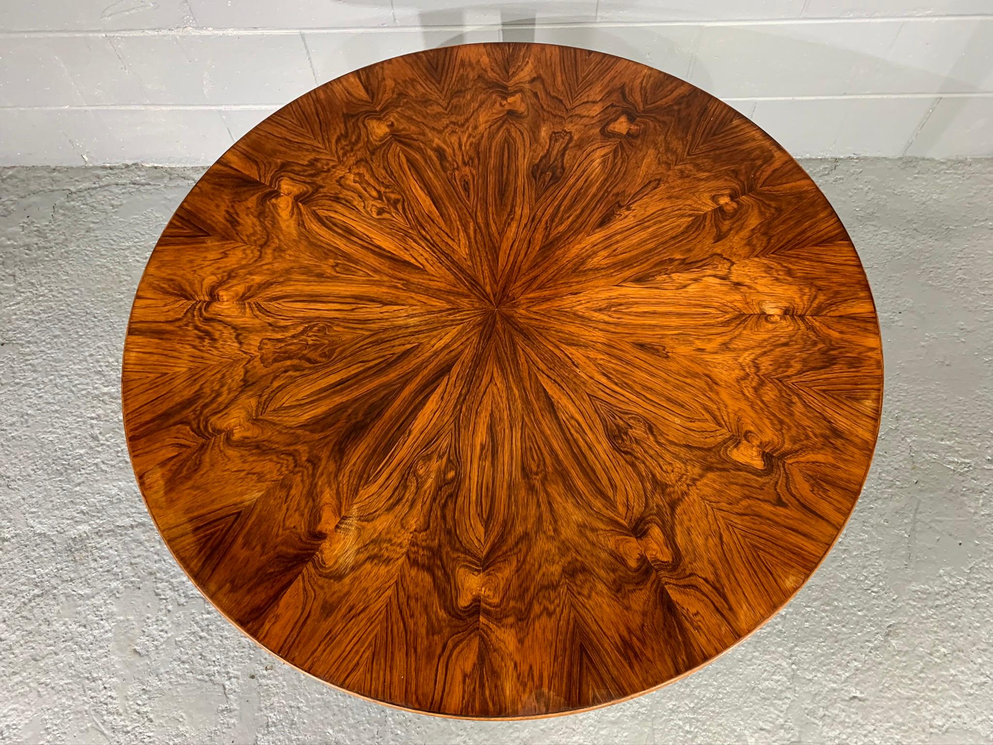 Extraordinary dramatic figured grain rosewood round coffee table by Edvard Valentinsen. This Danish modern table is stamped with Edv. Valentinsen makers mark underneath piece. Excellent vintage condition. Top has been previously re-oiled.