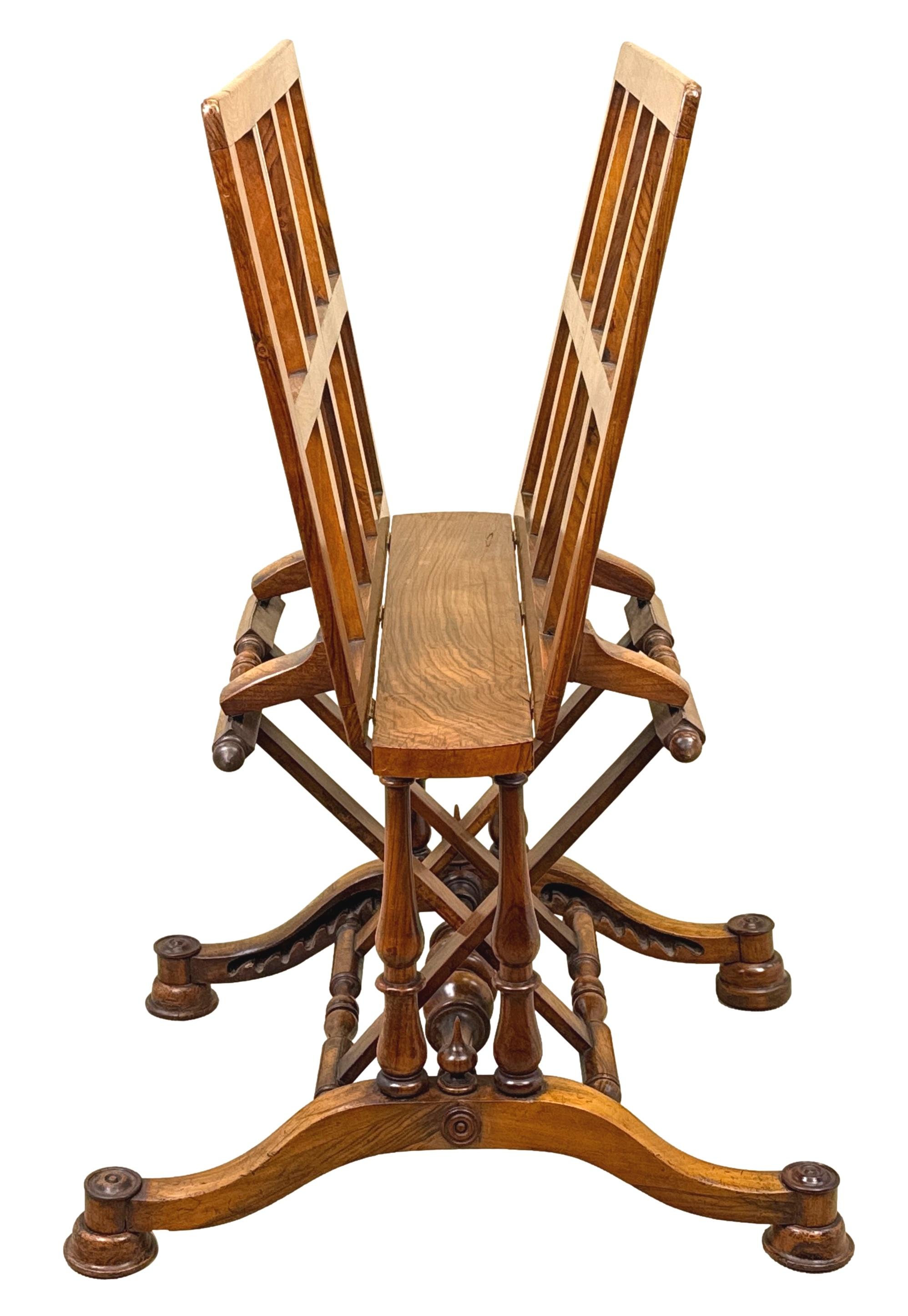 A Very Attractive And Highly Figured, Mid 19th Century Victorian Walnut Artists Folio Stand, The Lattice Design Hinged Rests With Ratcheted Diagonal Supports, Raised On Elegant Turned Spindles To Each End, United By Cross Stretchers And Four Sabre