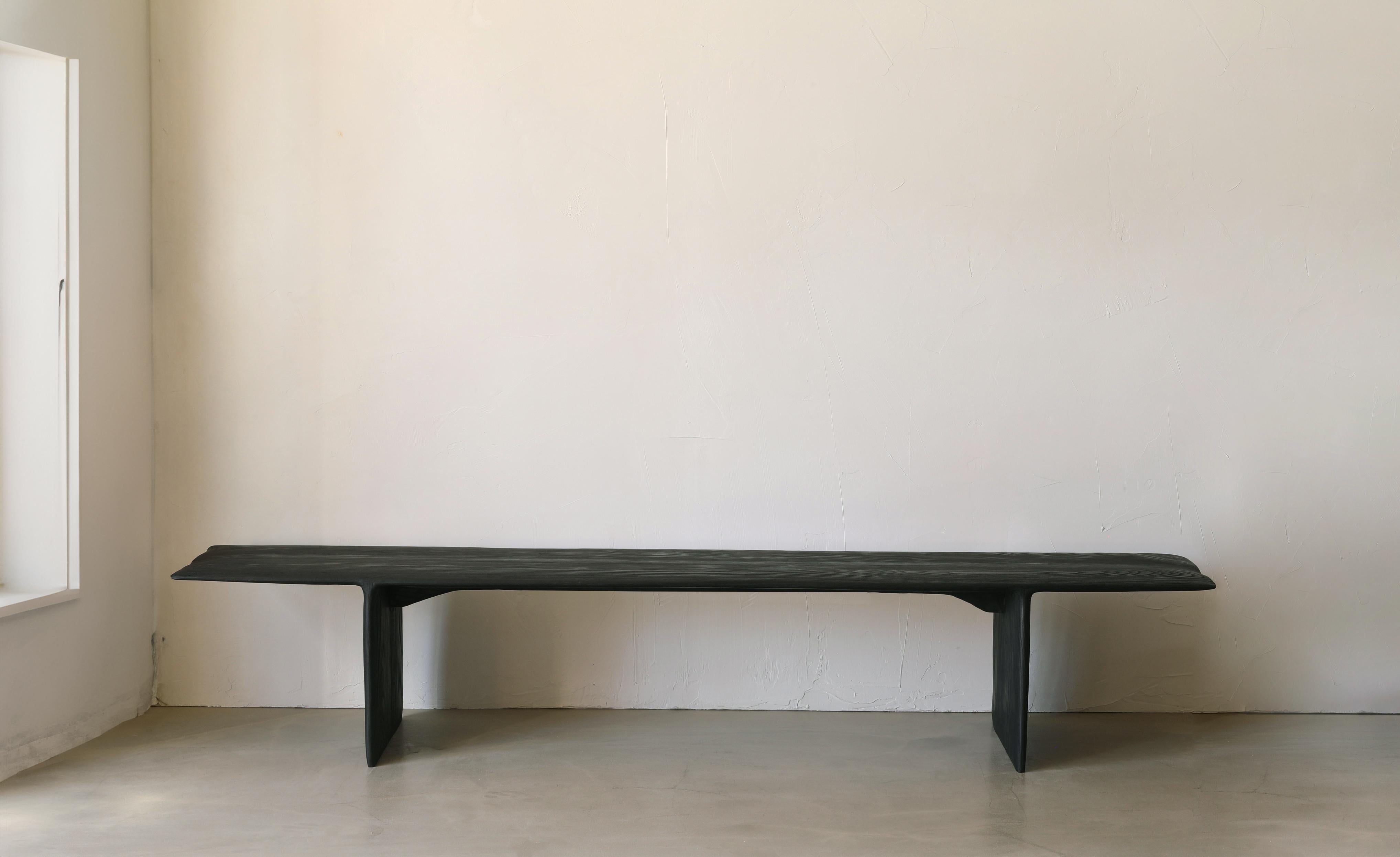 The Figures Bench is a 7-foot bench with a 16” deep seat and 16” height. The default top and base are burnt ash but can be optioned out at additional cost.

The piece comes from the FIGURES collection which can be easily identified by its visually