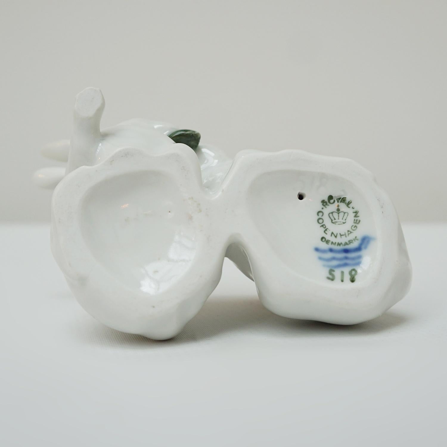 A porcelain gloss finished figurine of two rabbits designed by Arnold Krog for Royal Copenhagen.

Dimensions: H 6cm W 11cm D 6cm

Origin: Danish

Date: 1923

Item Number: 0407232