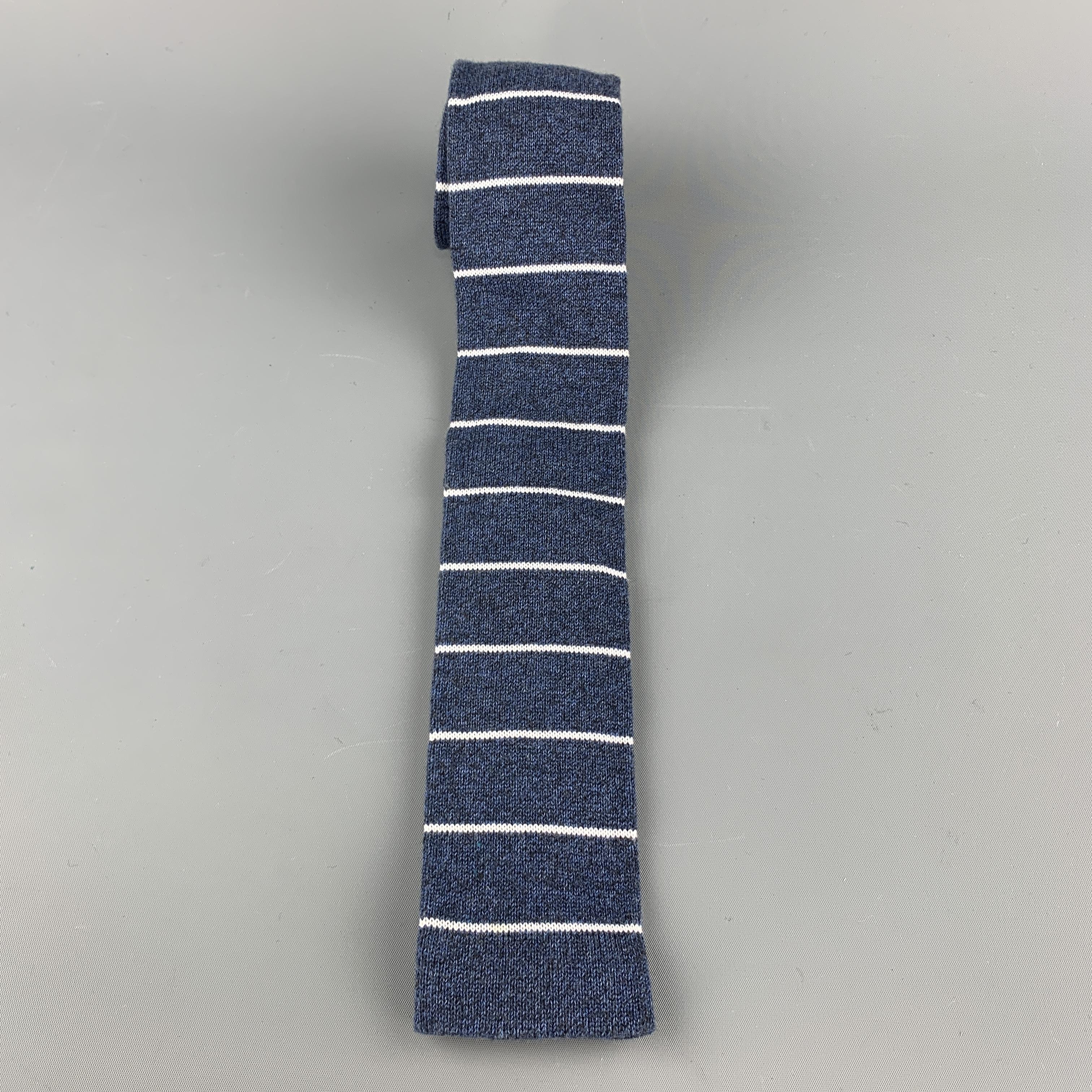 FIL D'ECOSSE necktie comes in blue cotton knit with squared tip and all over stripe print. Made in Italy.

Excellent Pre-Owned Condition.

Width: 2.5 in.
