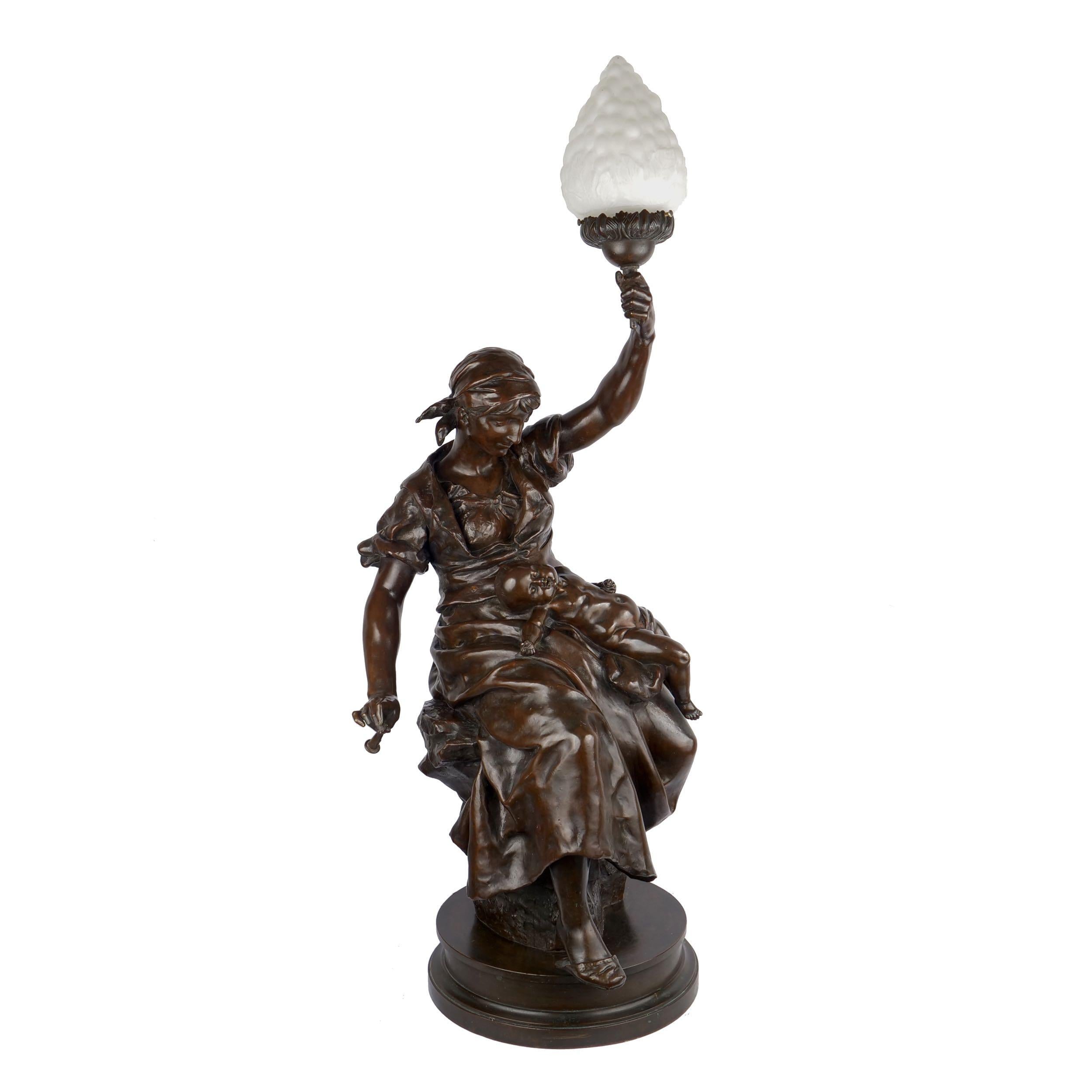 A very large work that captures the attention of the viewer immediately, this is a piece that was intended for display in the corner on a large pedestal, allowing the lamp to bring highlight to the sculpture. 

It was sculpted in two versions and